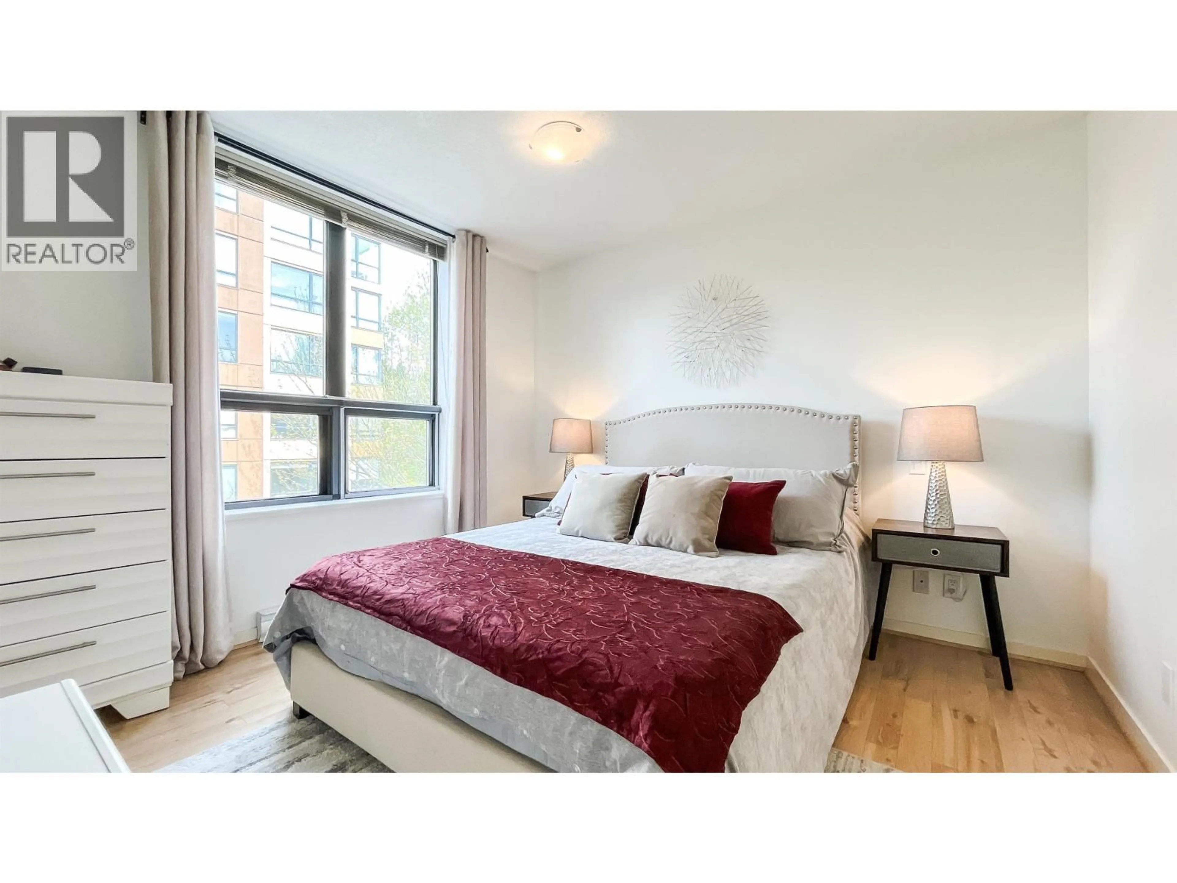 Bedroom with bed, unknown for 305 - 3638 VANNESS AVENUE, Vancouver British Columbia V5R6H6