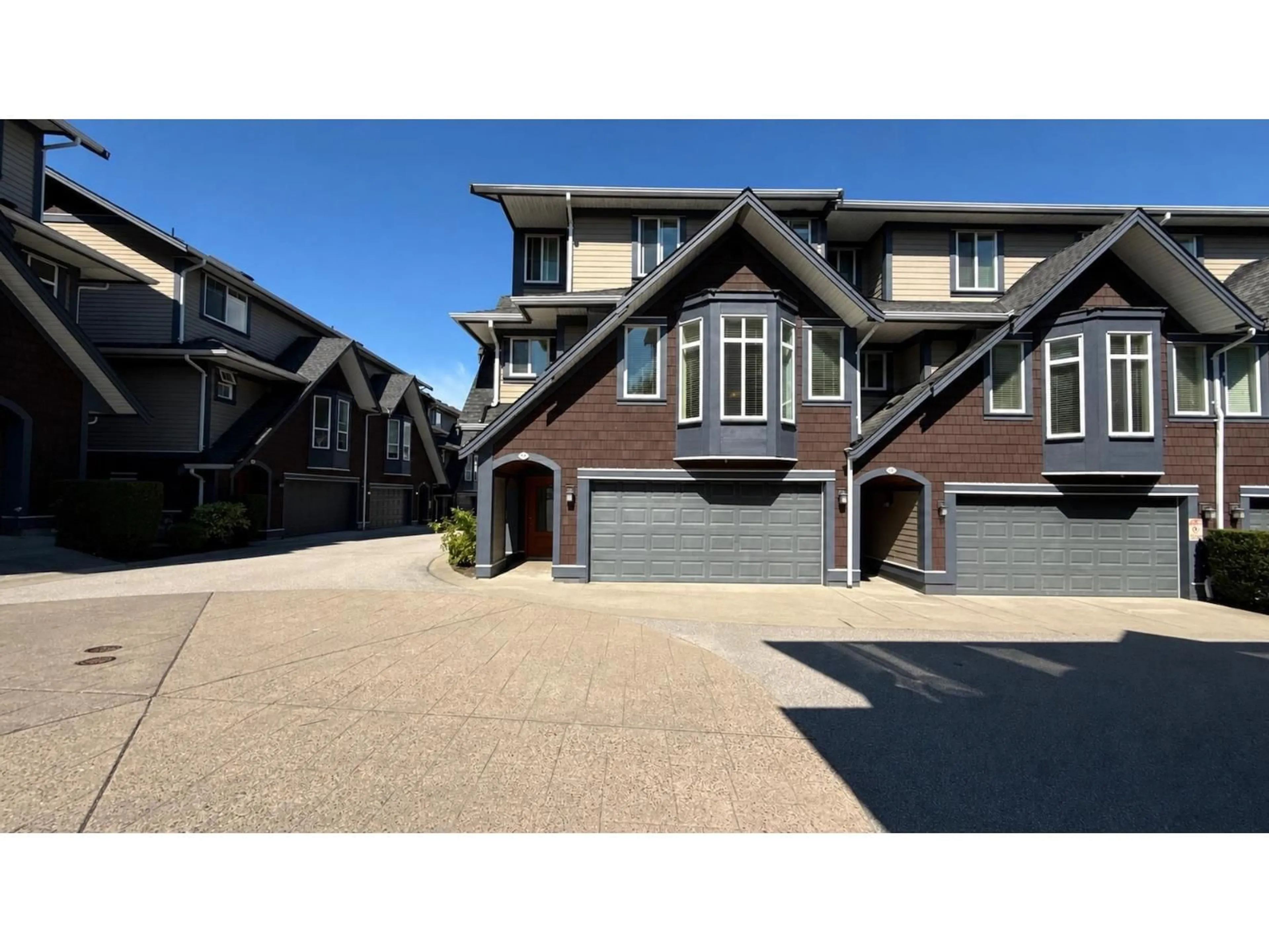 A pic from outside/outdoor area/front of a property/back of a property/a pic from drone, street for 10 - 15977 26 AVENUE, Surrey British Columbia V3Z2W7