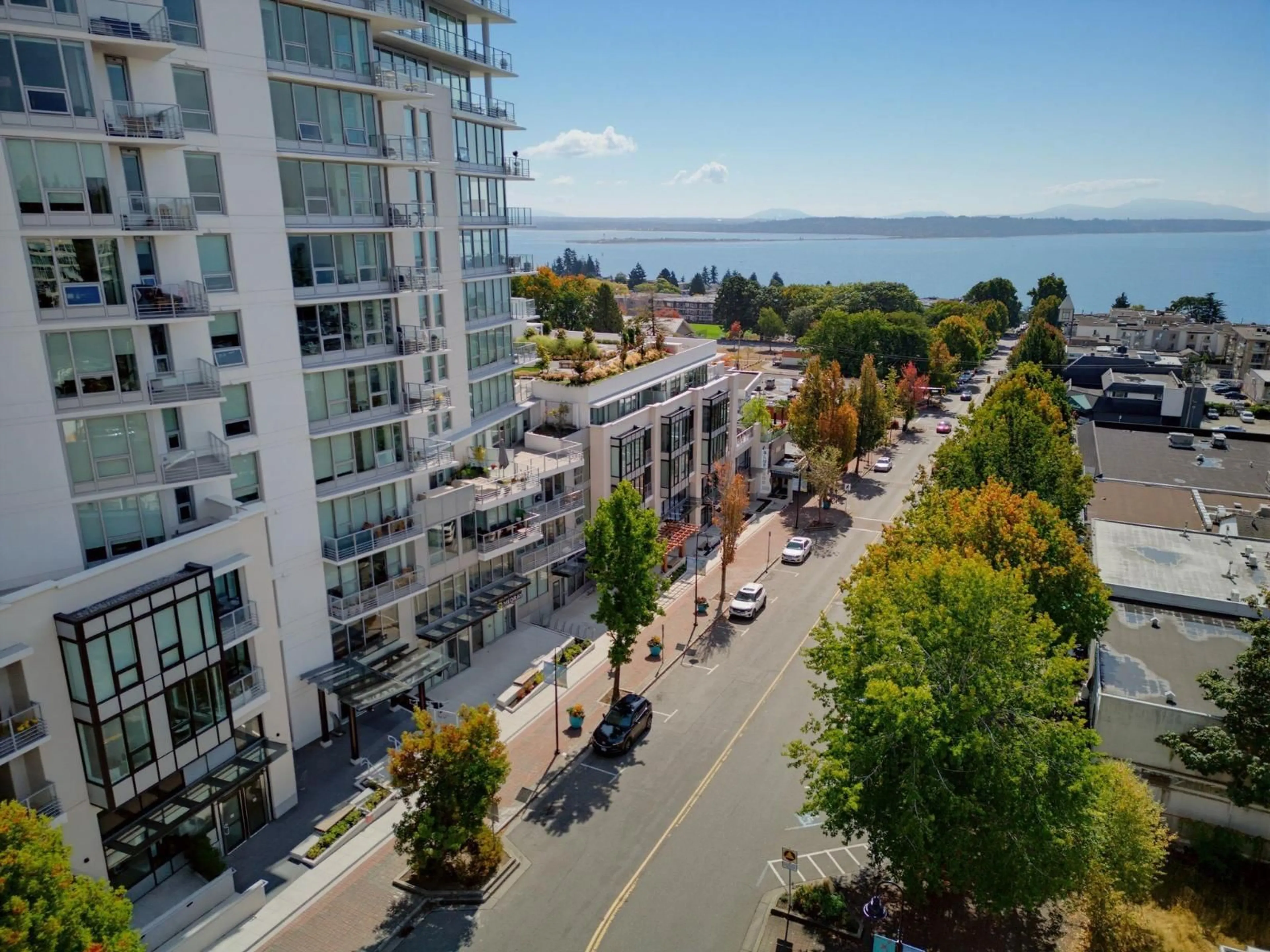 A pic from outside/outdoor area/front of a property/back of a property/a pic from drone, water/lake/river/ocean view for 212 - 1342 JOHNSTON ROAD, White Rock British Columbia V4B0C7