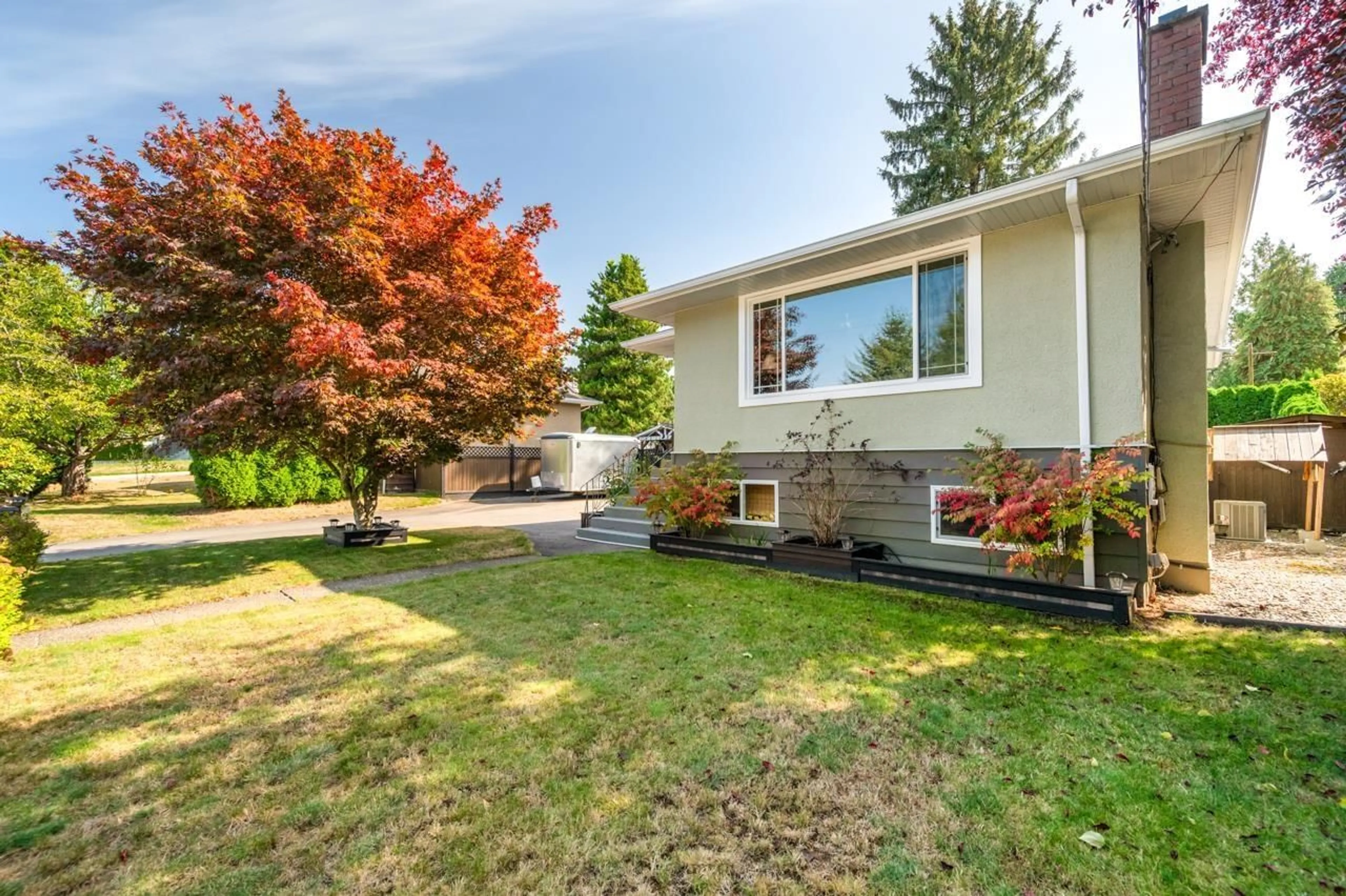 Home with vinyl exterior material, street for 12882 98A AVENUE, Surrey British Columbia V3T1C2