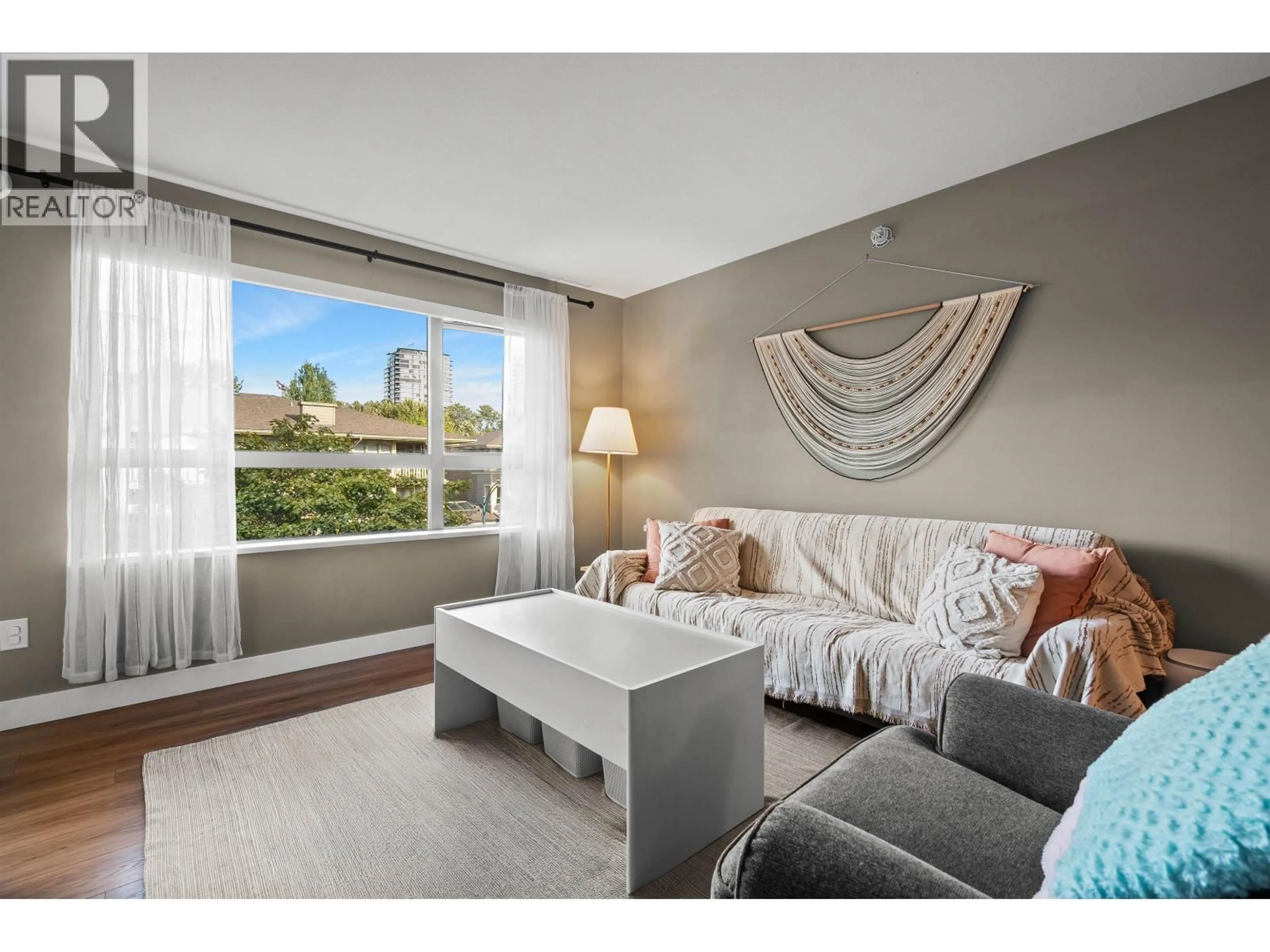 Living room with furniture, unknown for 407 - 700 KLAHANIE DRIVE, Port Moody British Columbia V3H5L3