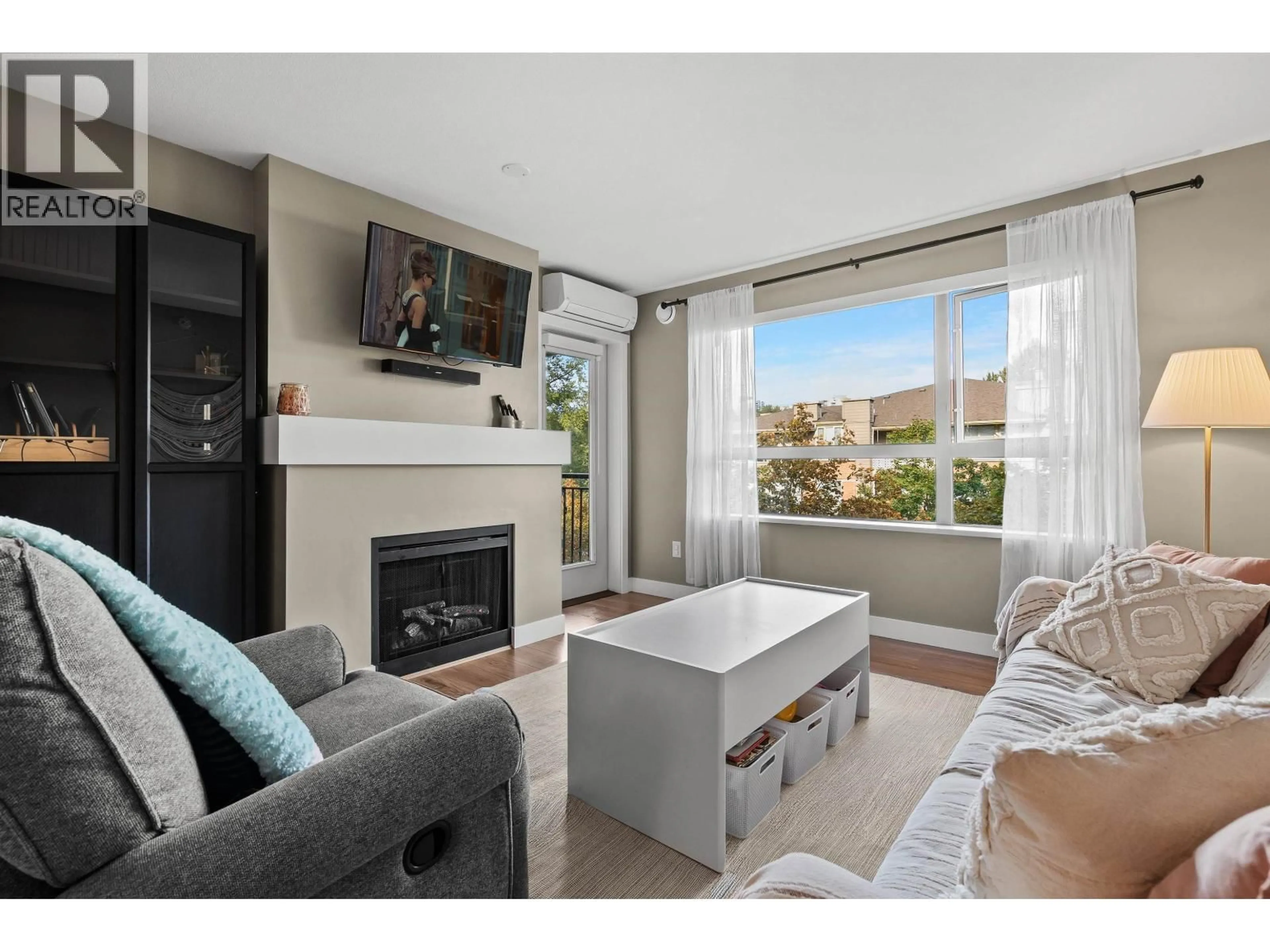 Living room with furniture, unknown for 407 - 700 KLAHANIE DRIVE, Port Moody British Columbia V3H5L3