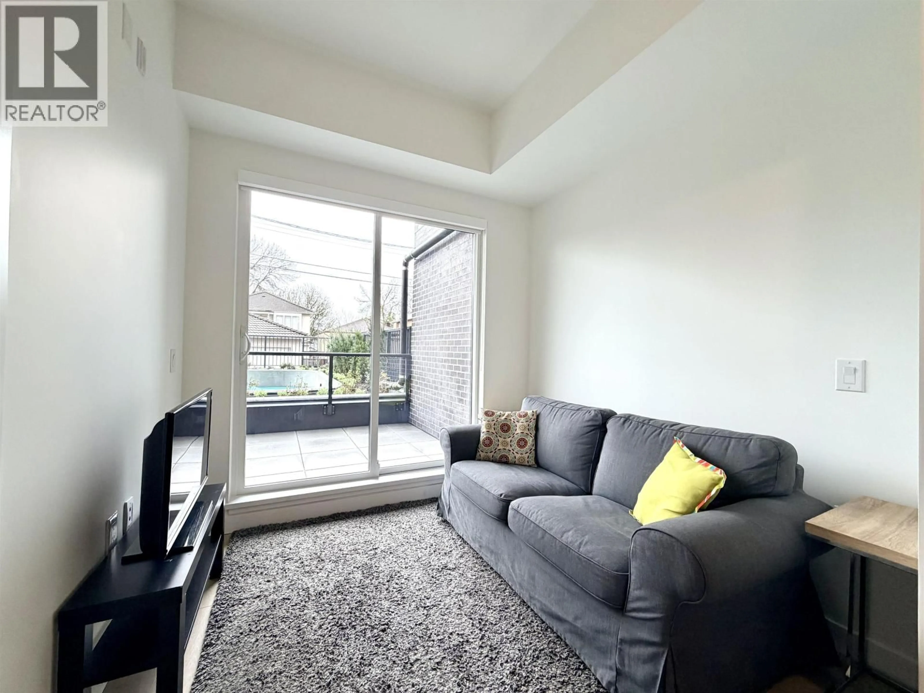 Living room with furniture, unknown for 105 - 2268 BROADWAY, Vancouver British Columbia V5N0L2