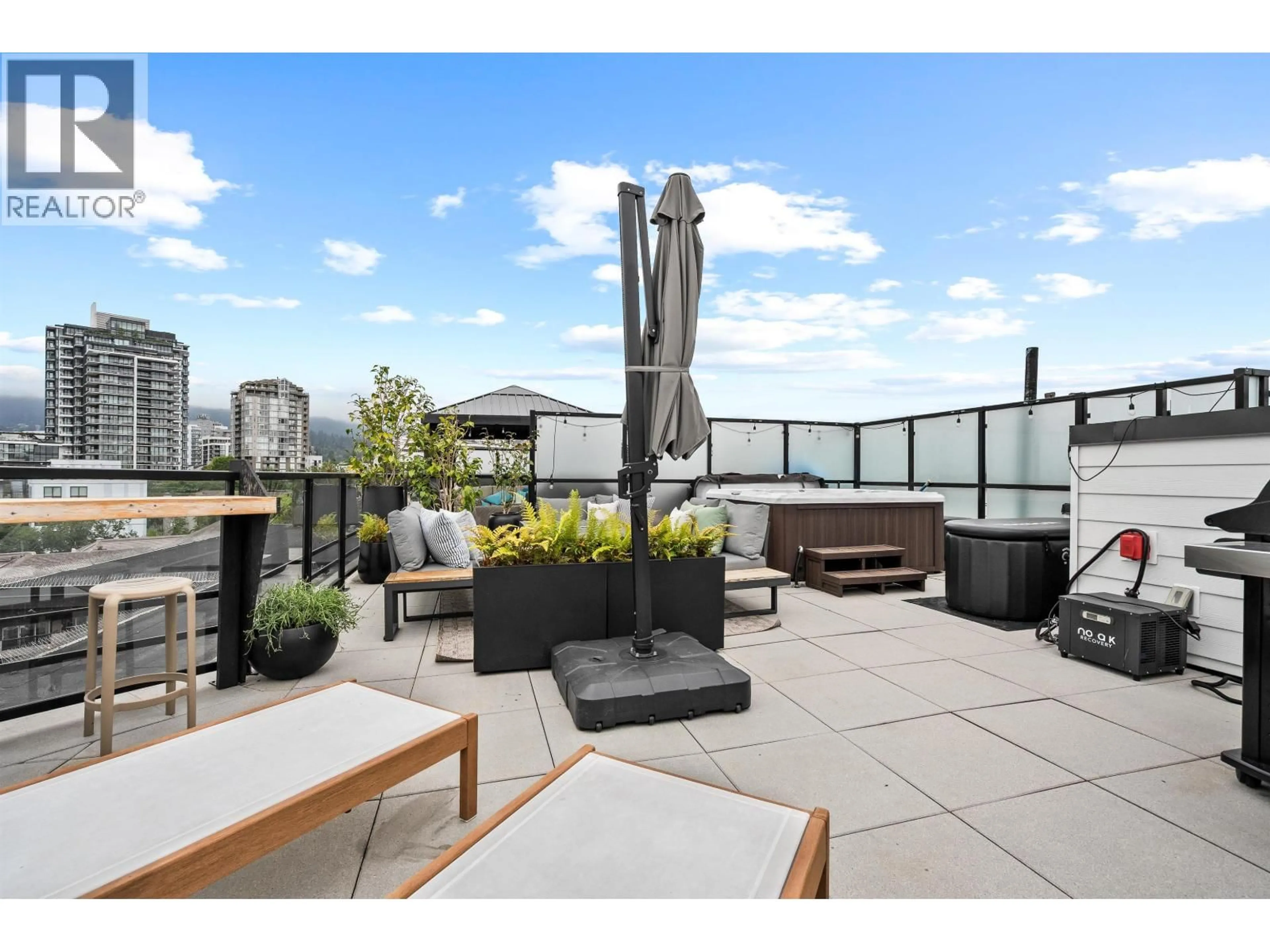 Patio, city buildings view from balcony for 614 - 108 8TH STREET, North Vancouver British Columbia V7L0H1
