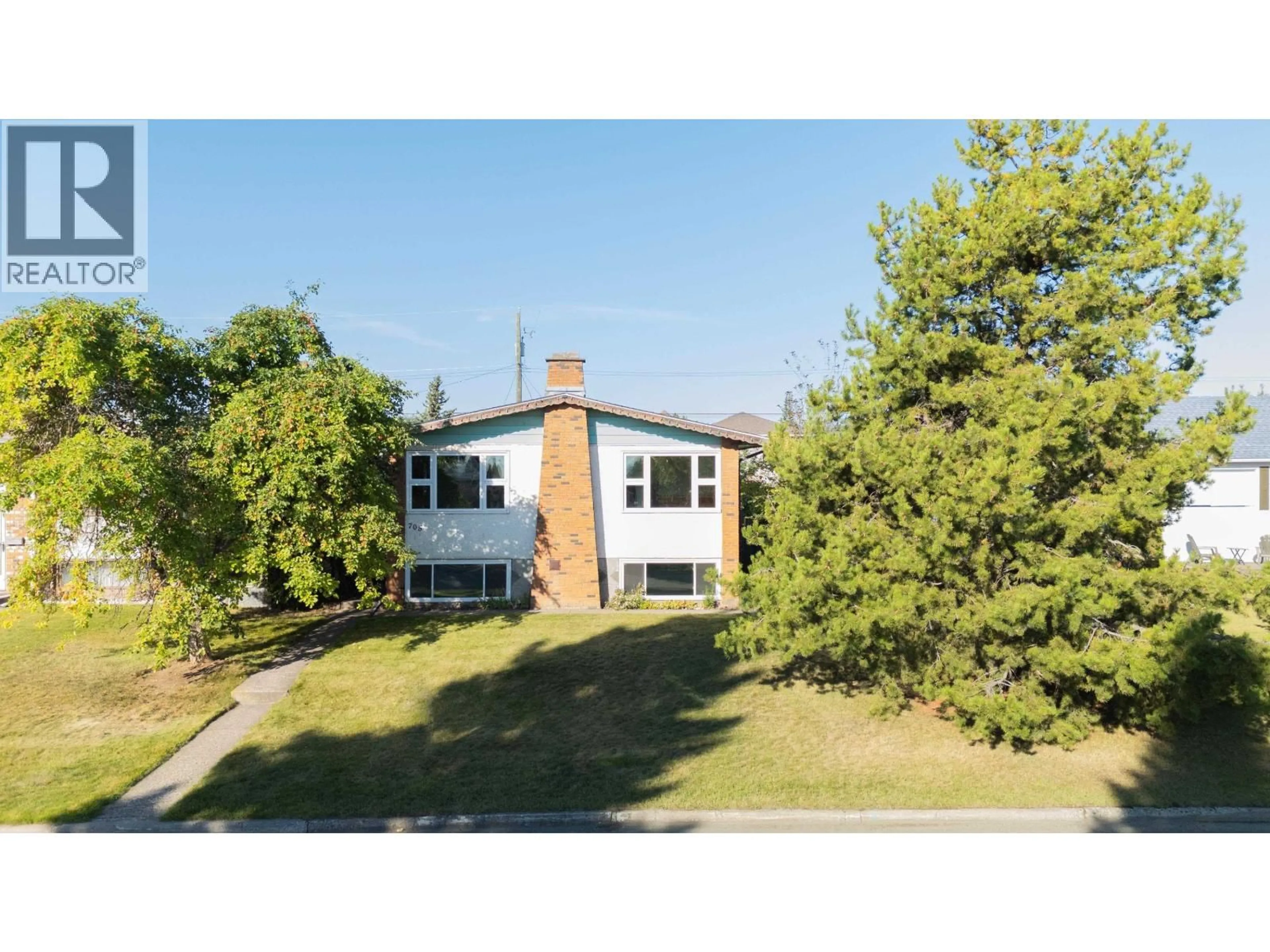 A pic from outside/outdoor area/front of a property/back of a property/a pic from drone, unknown for 705 IRWIN STREET, Prince George British Columbia V2M2X6