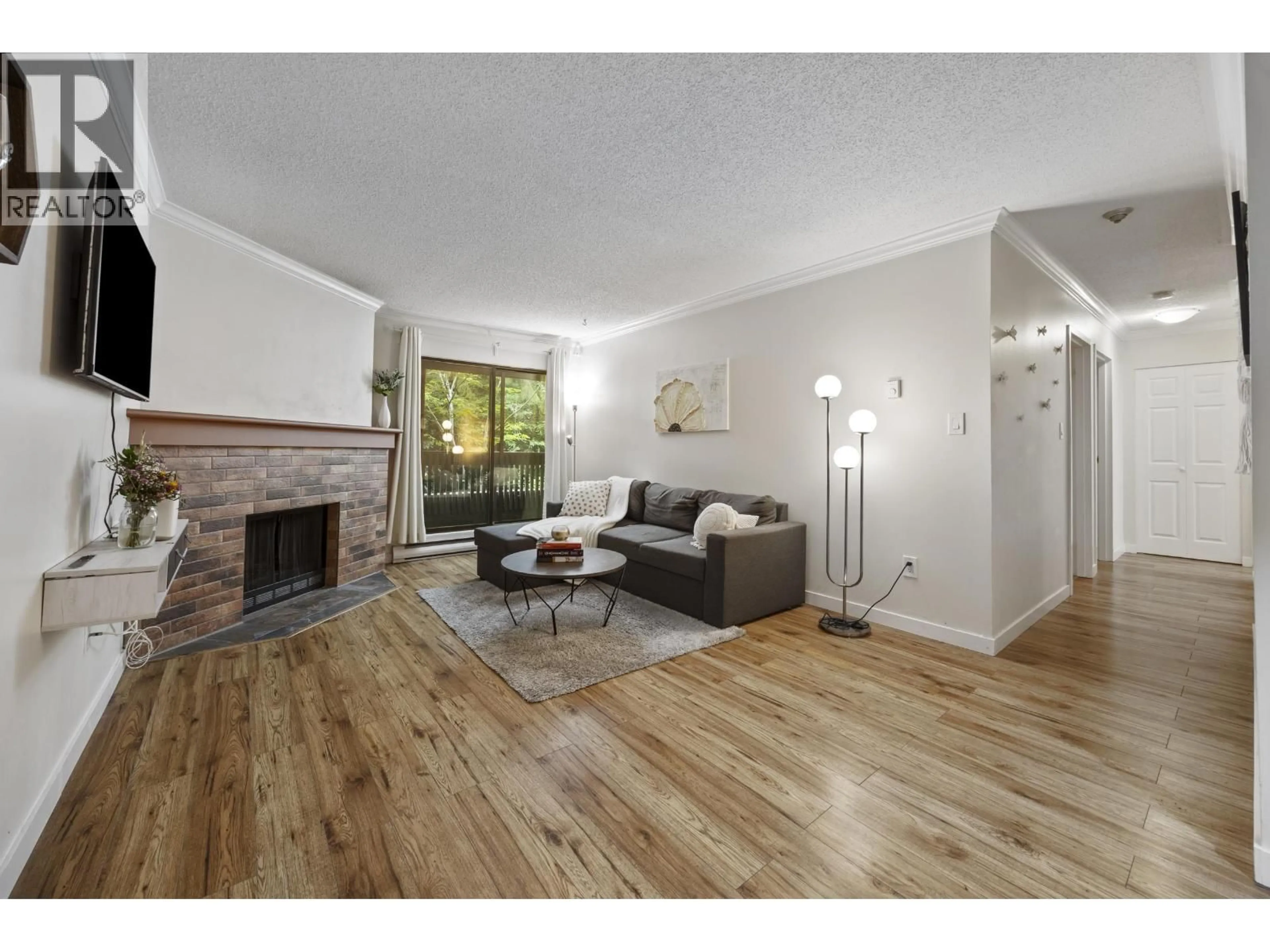 Living room with furniture, wood/laminate floor for 118 - 7431 MINORU BOULEVARD, Richmond British Columbia V6Y1Z3