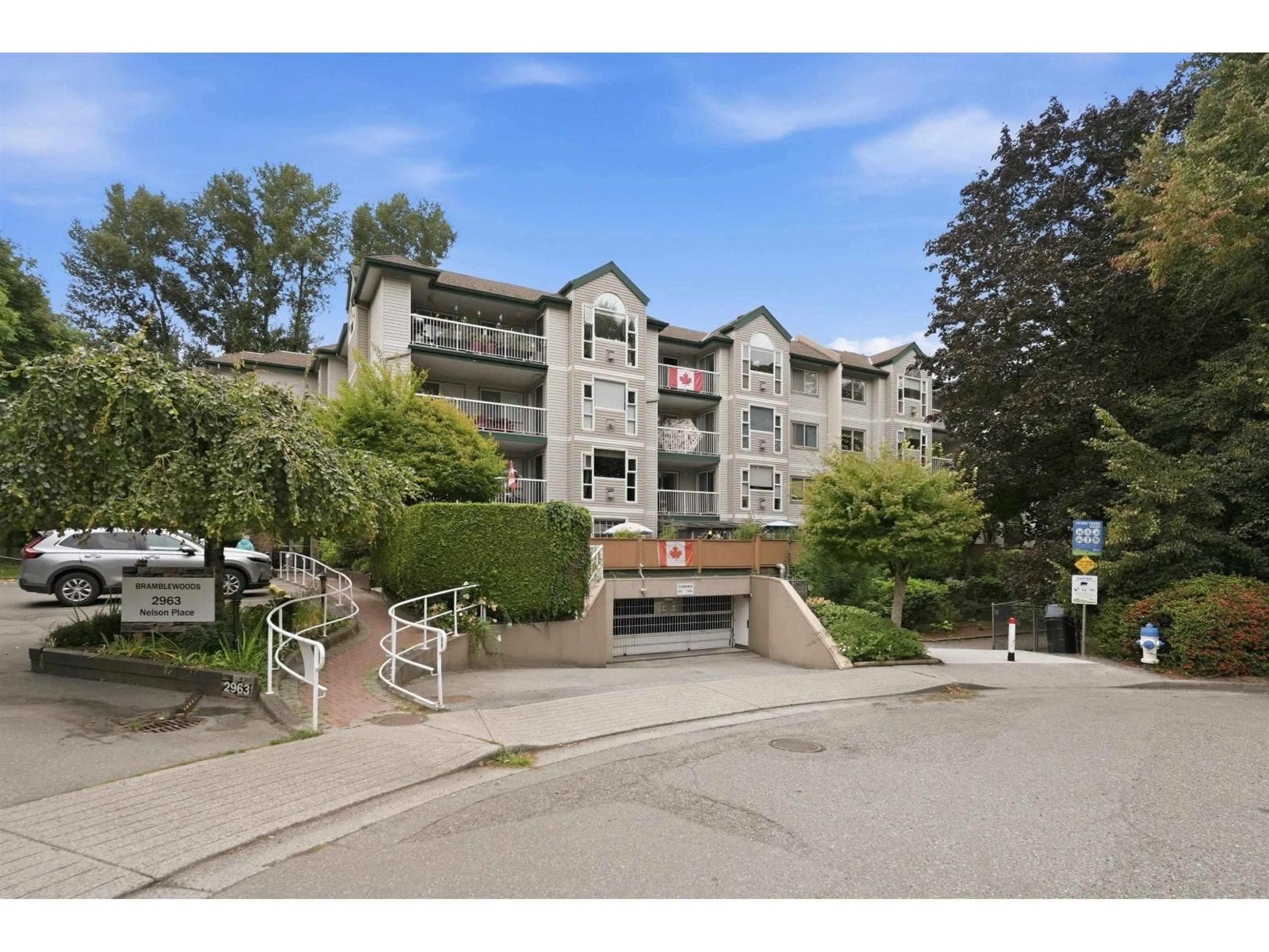 A pic from outside/outdoor area/front of a property/back of a property/a pic from drone, mountain view for 305 - 2963 NELSON PLACE, Abbotsford British Columbia V2S7L6