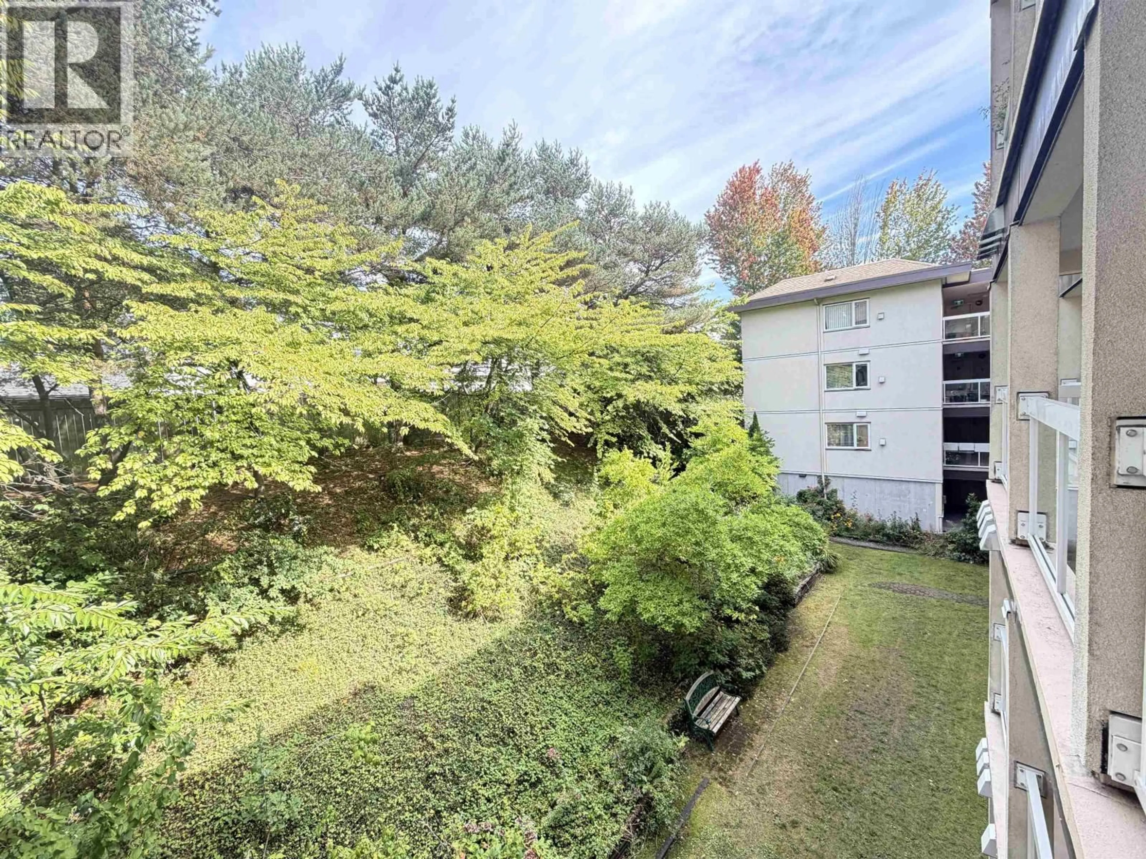 A pic from outside/outdoor area/front of a property/back of a property/a pic from drone, forest/trees view for 309 - 2677 E BROADWAY, Vancouver British Columbia V5M1Y6