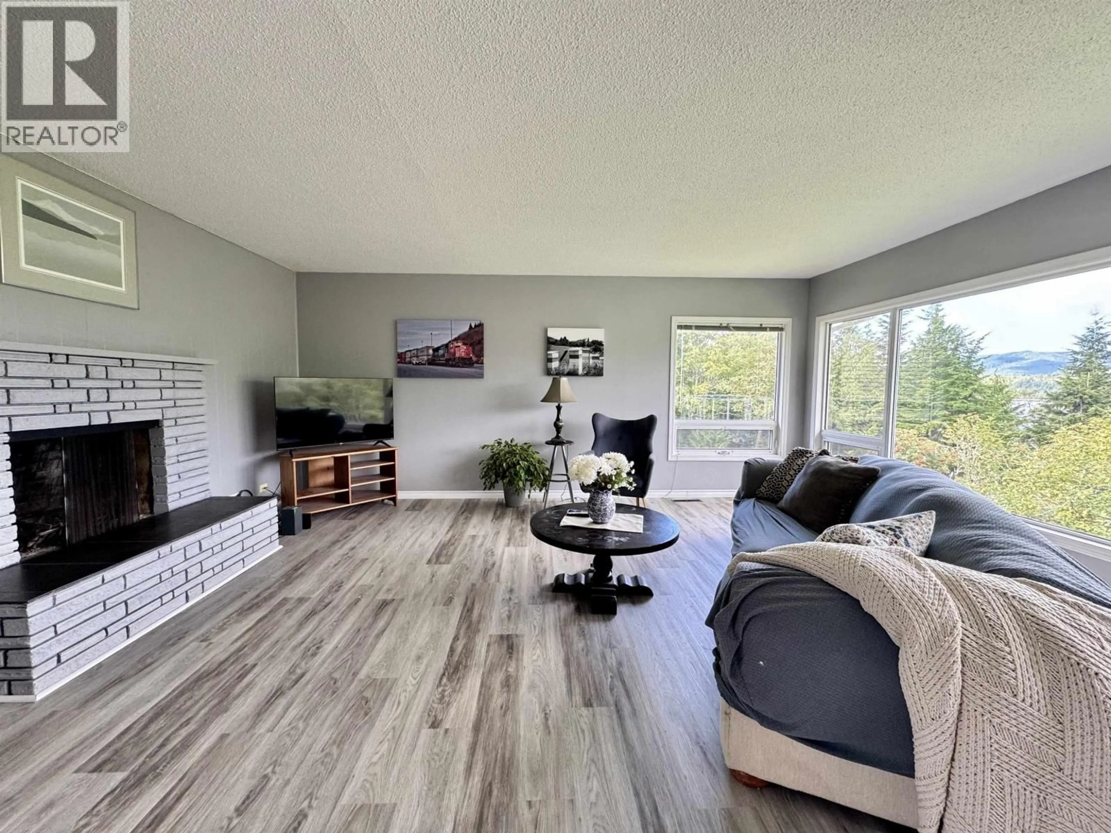 Living room with furniture, wood/laminate floor for 707 4TH AVENUE, Prince Rupert British Columbia V8J1P2