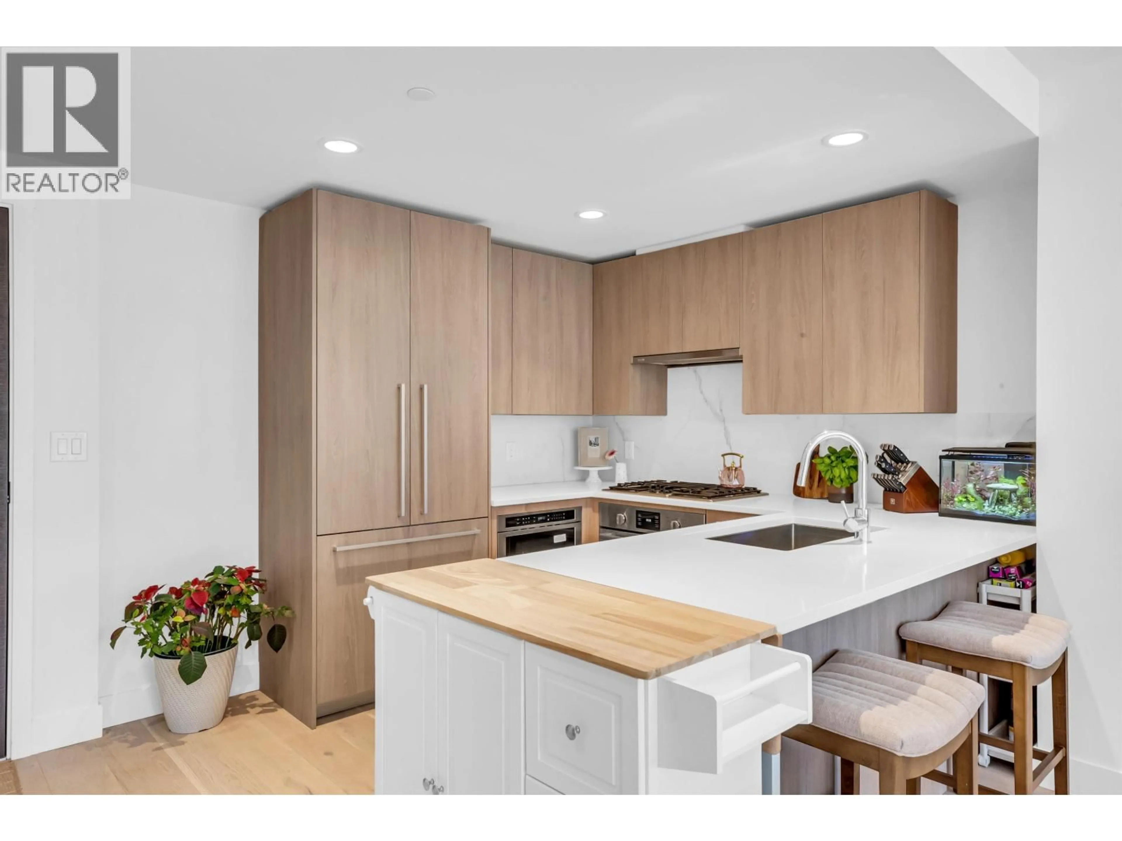 Open concept kitchen, unknown for 305 - 2707 LIBRARY LANE, North Vancouver British Columbia V7J0C6