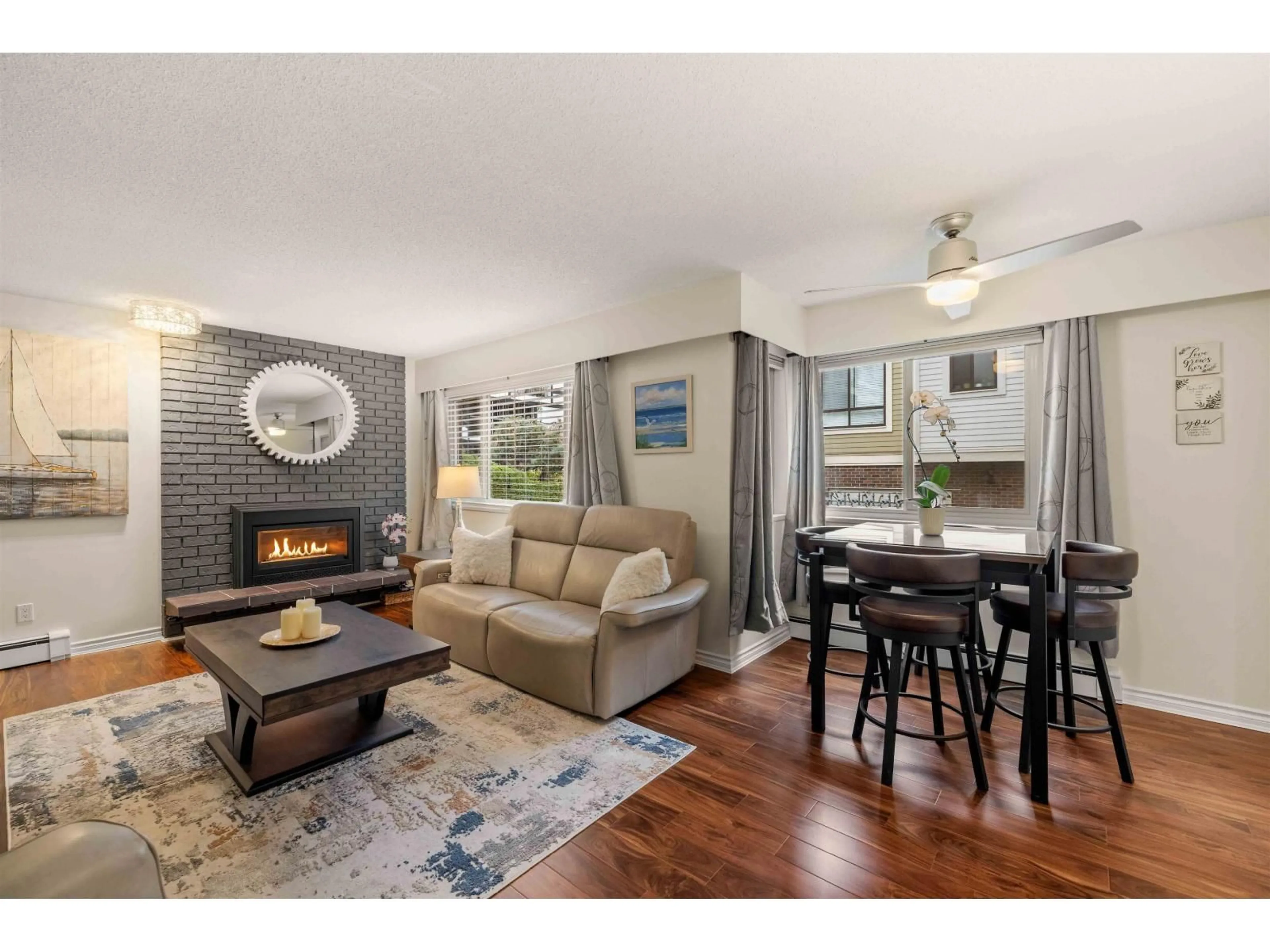 Living room with furniture, wood/laminate floor for 107 - 1368 FOSTER STREET, White Rock British Columbia V4B3X4