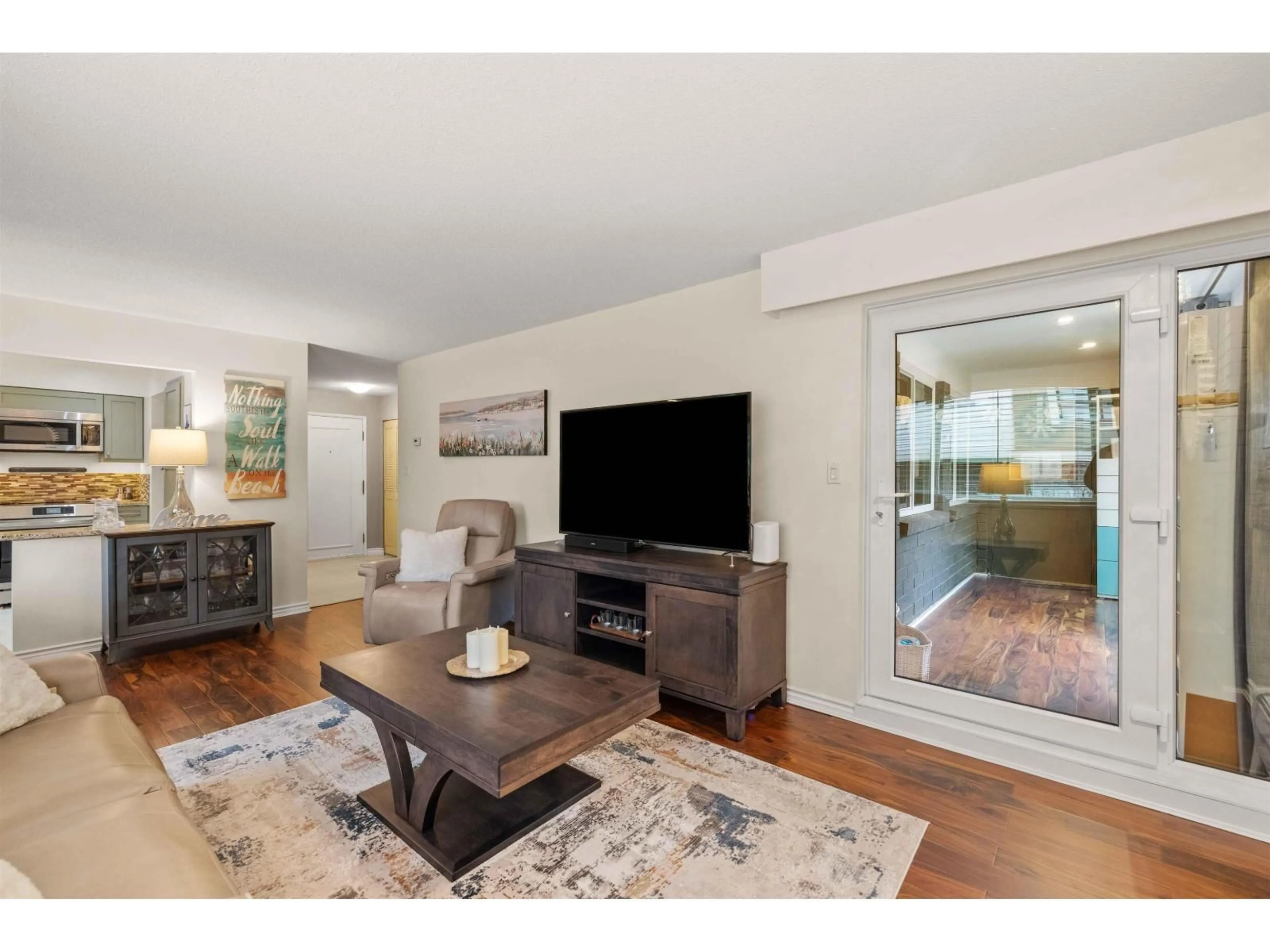 Living room with furniture, wood/laminate floor for 107 - 1368 FOSTER STREET, White Rock British Columbia V4B3X4