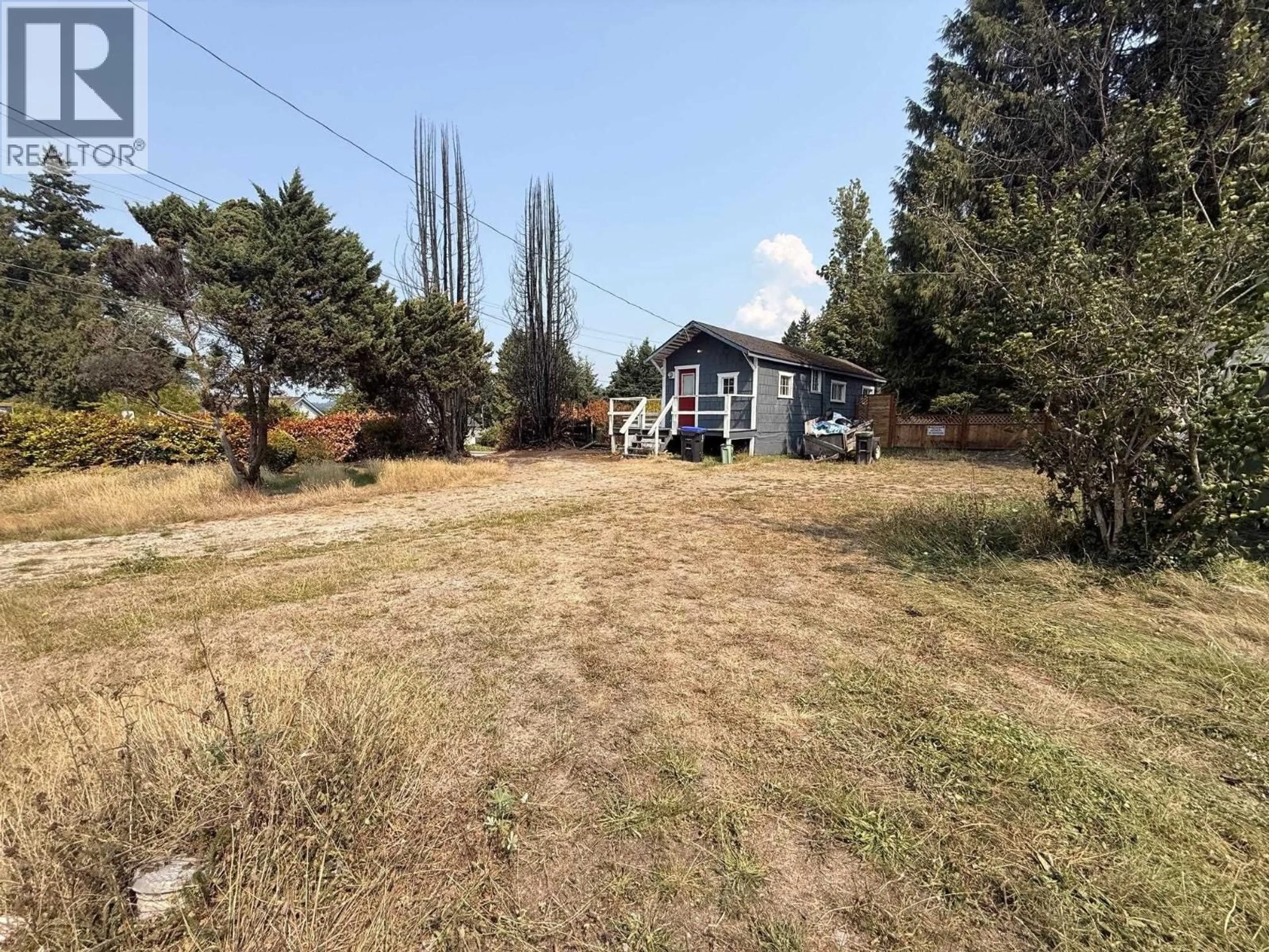 A pic from outside/outdoor area/front of a property/back of a property/a pic from drone, unknown for 5694 WHARF AVENUE, Sechelt British Columbia V0N3A0