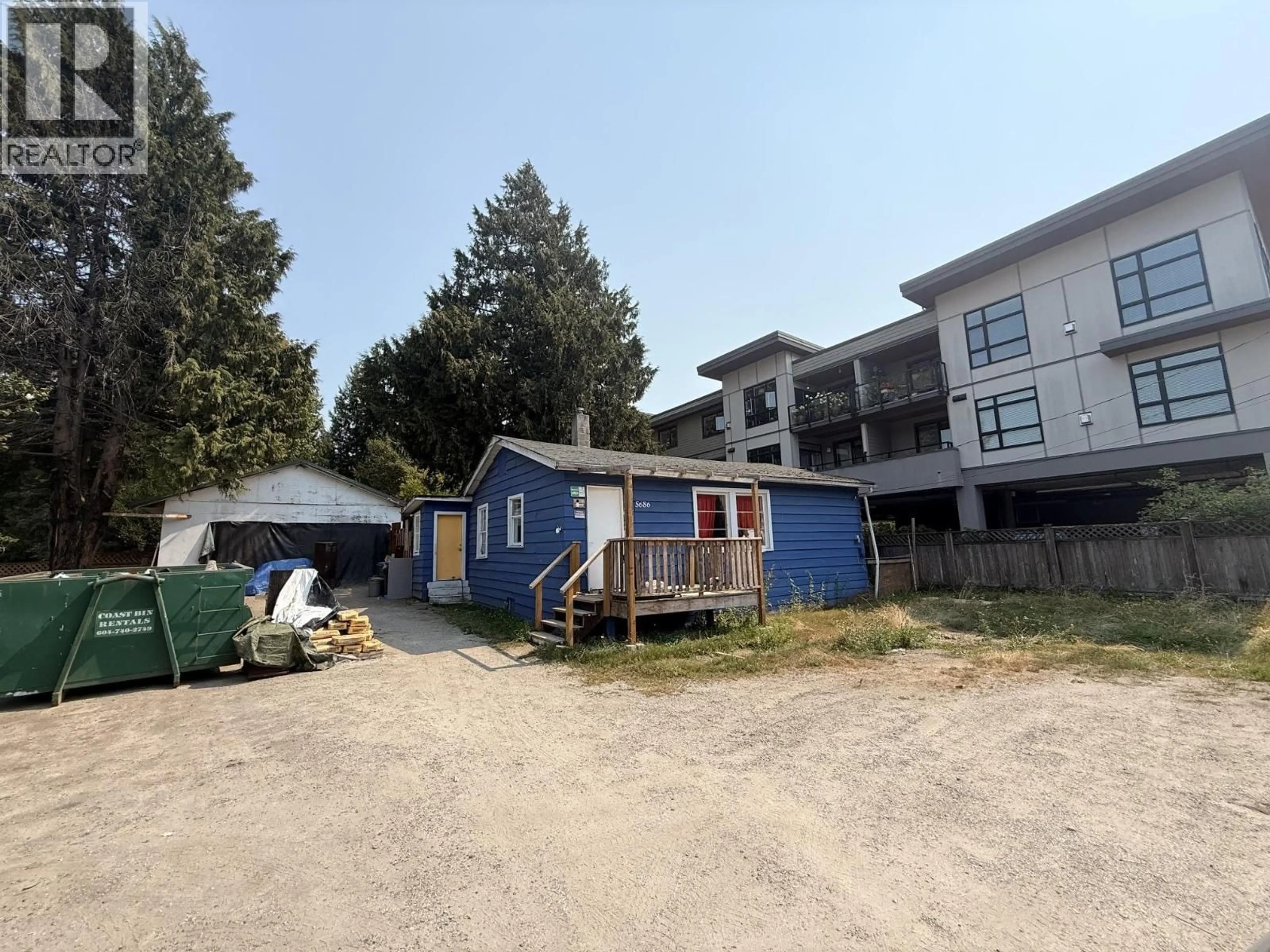 A pic from outside/outdoor area/front of a property/back of a property/a pic from drone, building for 5686 WHARF AVENUE, Sechelt British Columbia V0N3A0