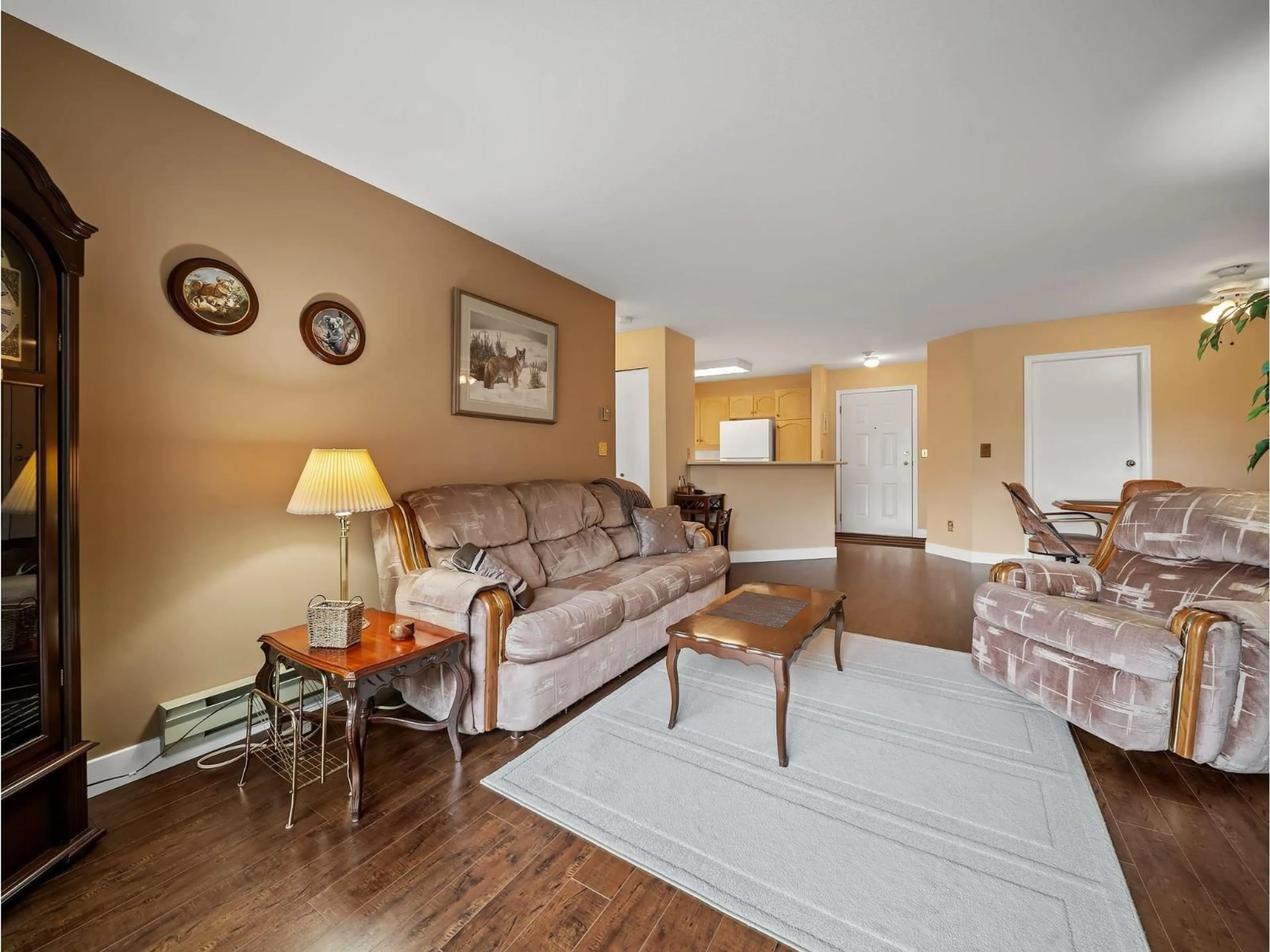 Living room with furniture, wood/laminate floor for 201 - 10743 139TH STREET, Surrey British Columbia V3T4L8