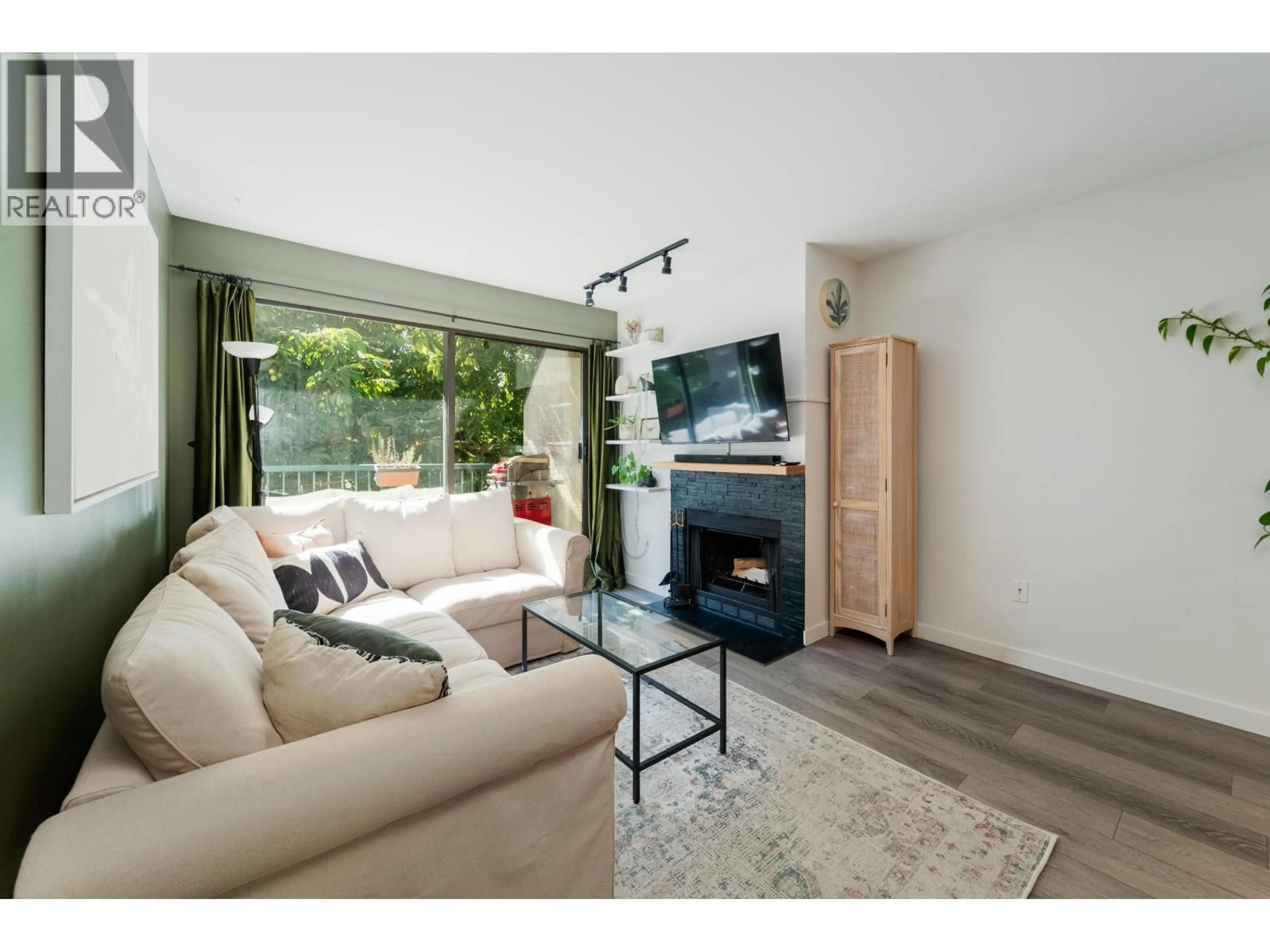 Living room with furniture, wood/laminate floor for 403 - 1169 NELSON STREET, Vancouver British Columbia V6E1J3