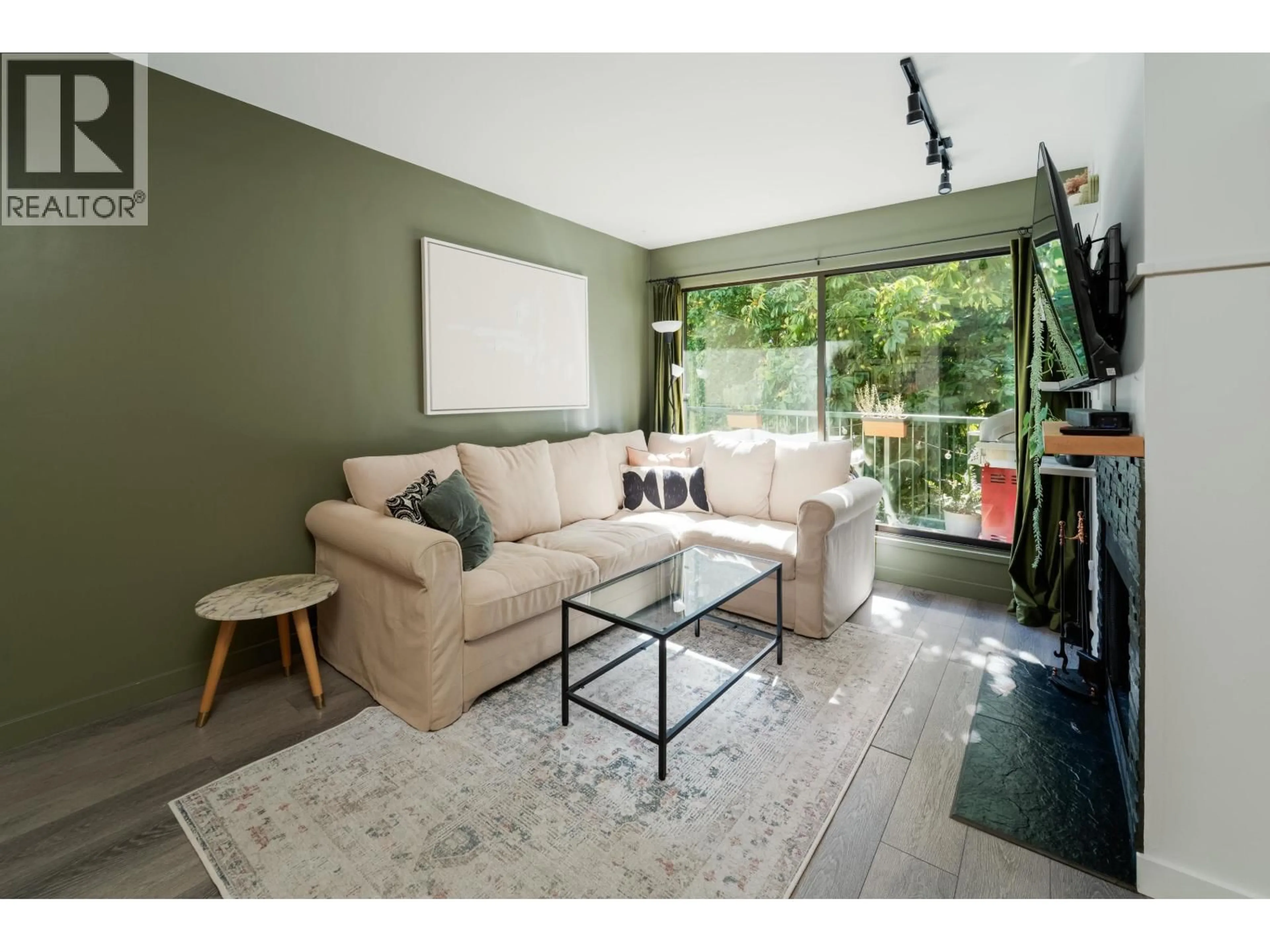 Living room with furniture, wood/laminate floor for 403 - 1169 NELSON STREET, Vancouver British Columbia V6E1J3