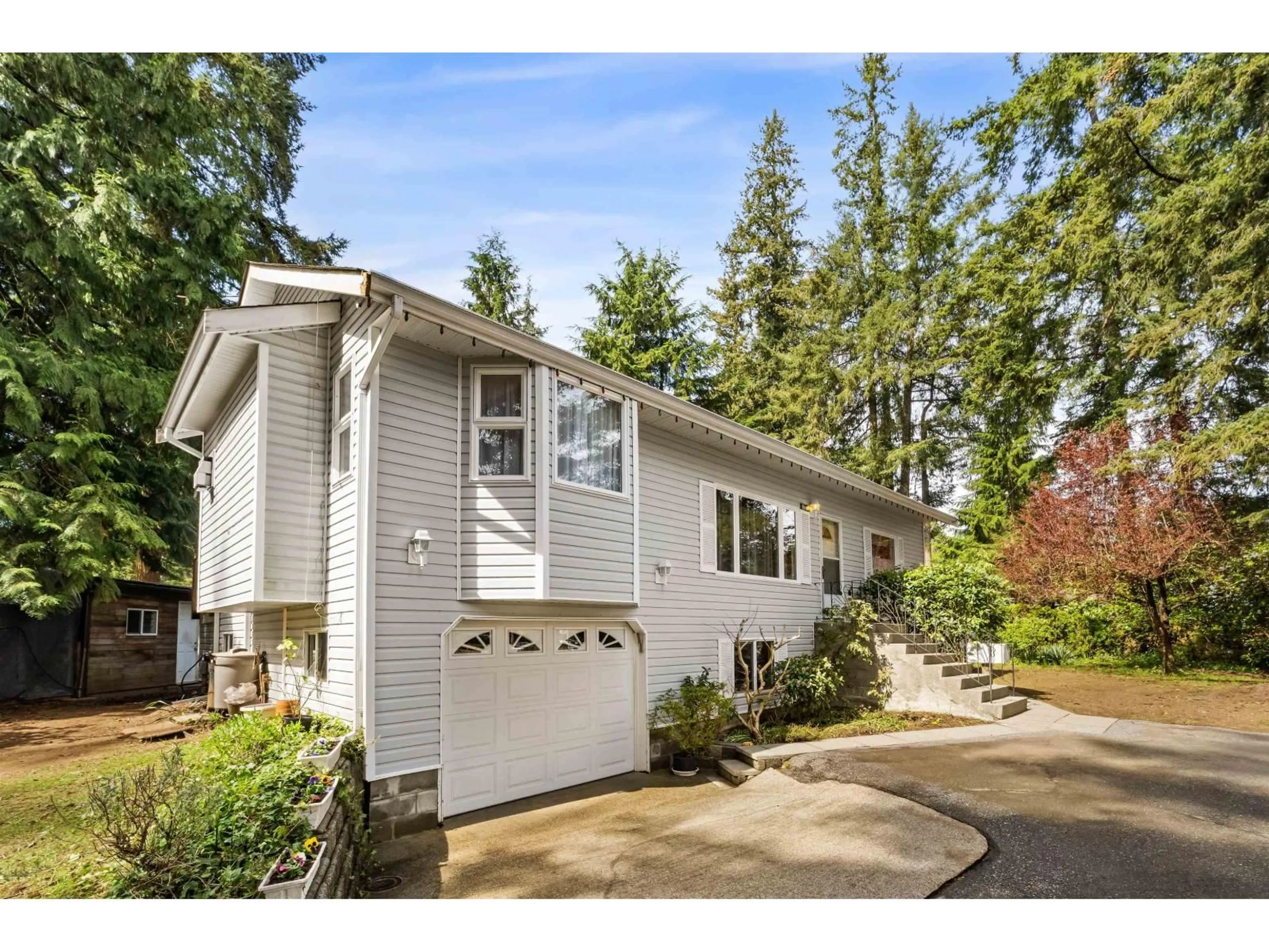 Home with vinyl exterior material, street for 20188 40 AVENUE, Langley British Columbia V3A2W5