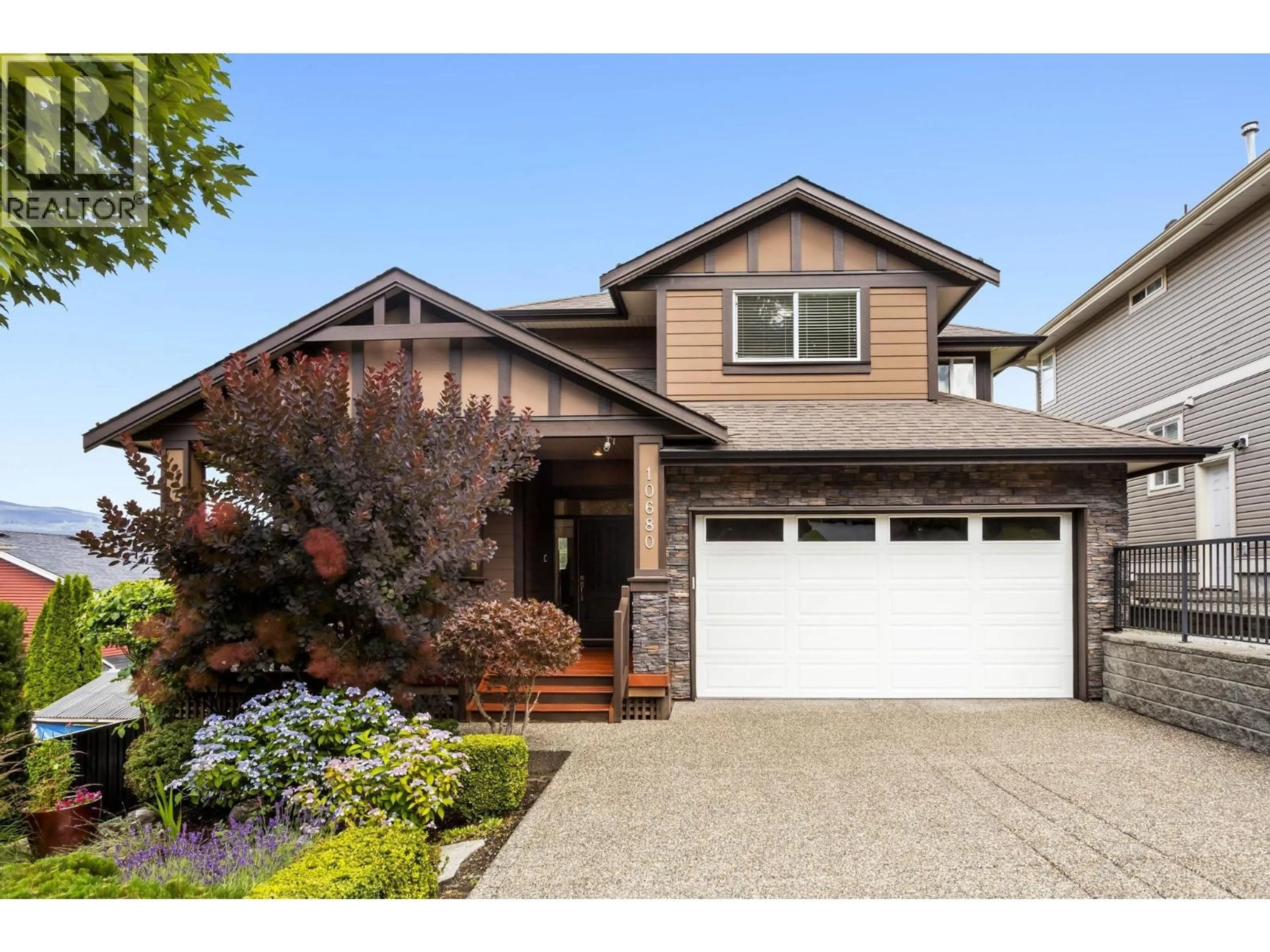 Home with vinyl exterior material, street for 10680 239 STREET, Maple Ridge British Columbia V2W0B3