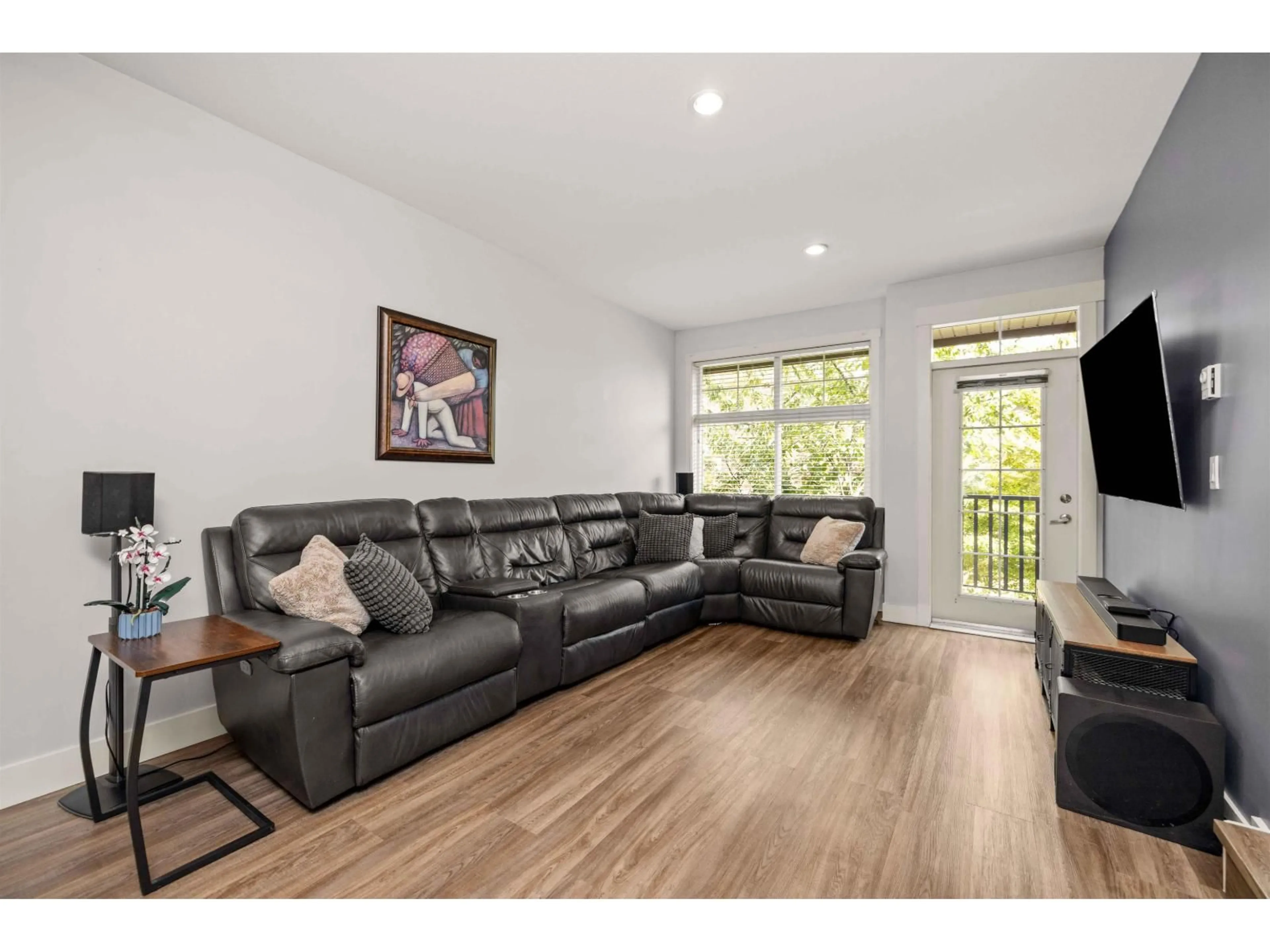 Living room with furniture, wood/laminate floor for 24 - 7332 194A STREET, Surrey British Columbia V4N6K9