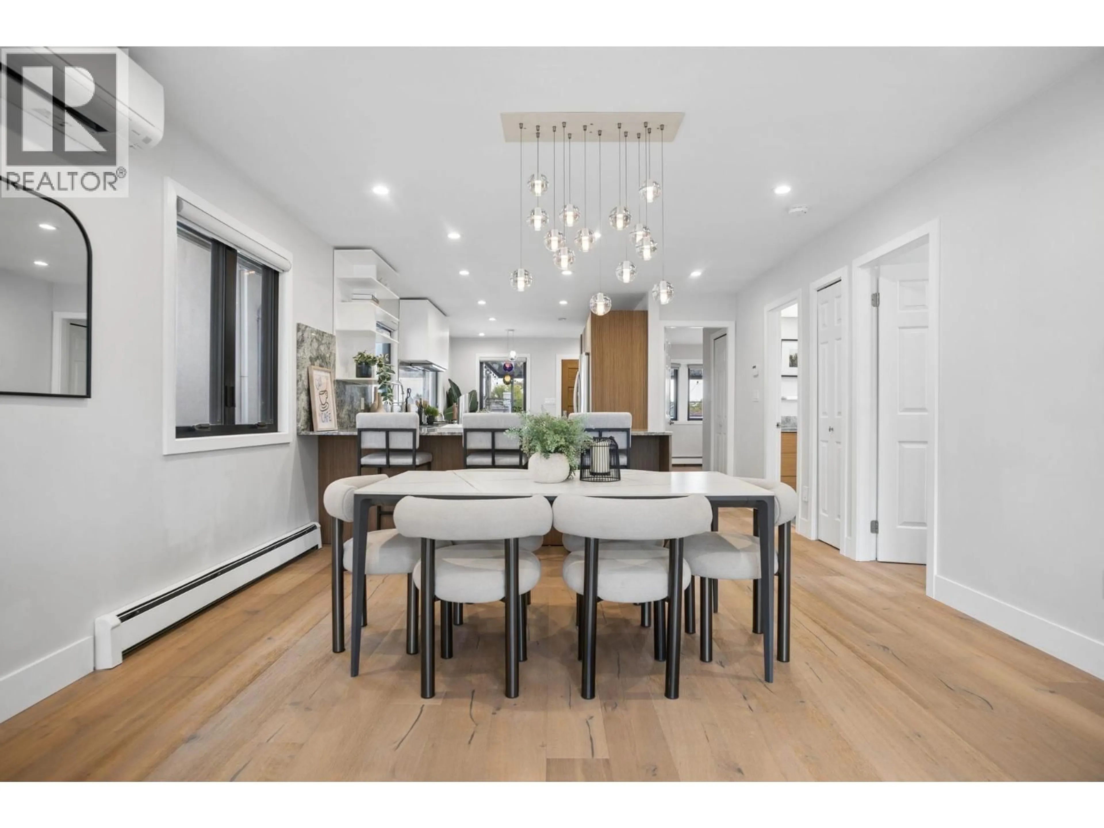 Open concept kitchen, wood/laminate floor for 76 46TH AVENUE, Vancouver British Columbia V5W1Z1