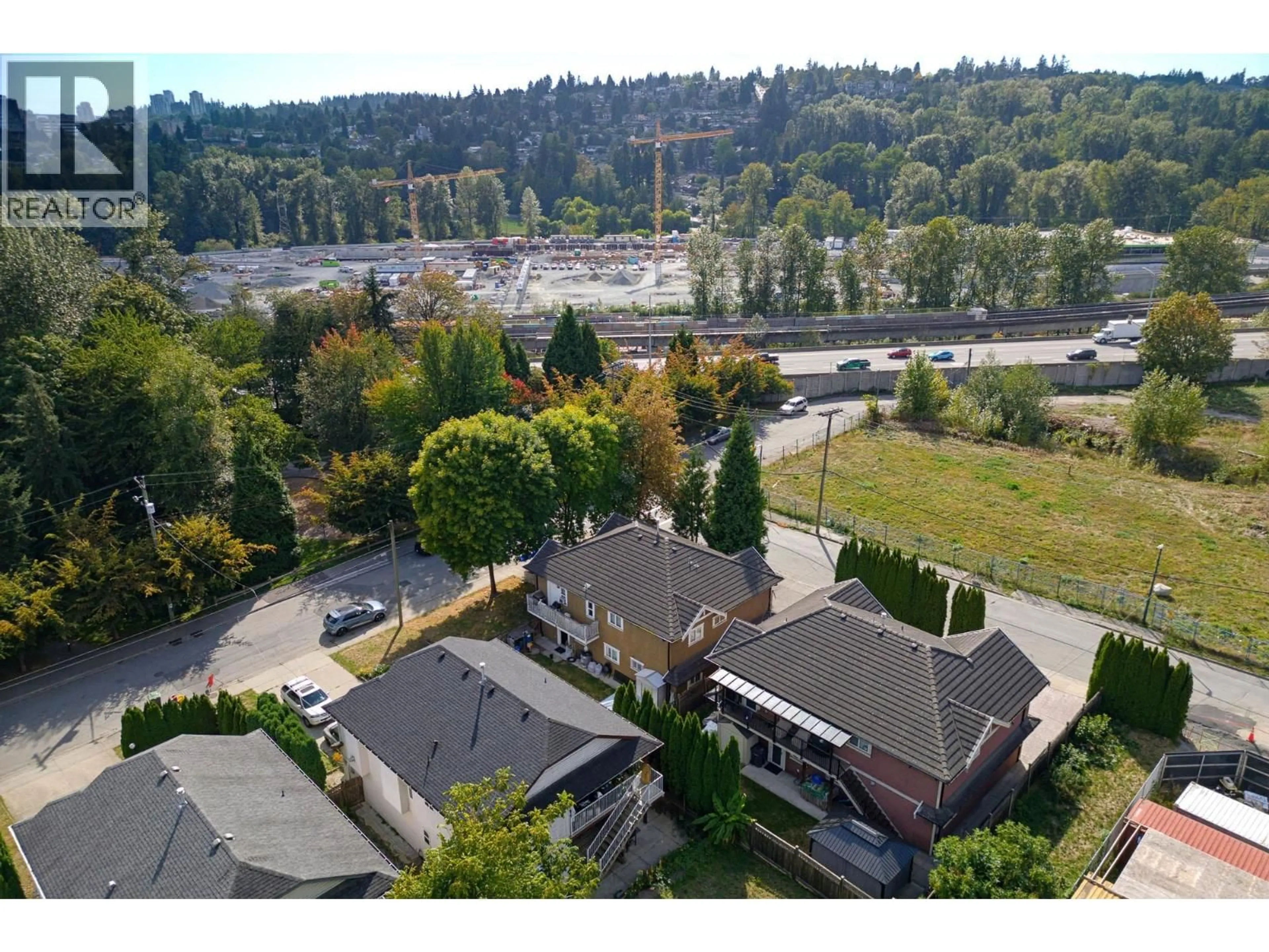 A pic from outside/outdoor area/front of a property/back of a property/a pic from drone, unknown for 575 ALDERSON AVENUE, Coquitlam British Columbia V3K1T4