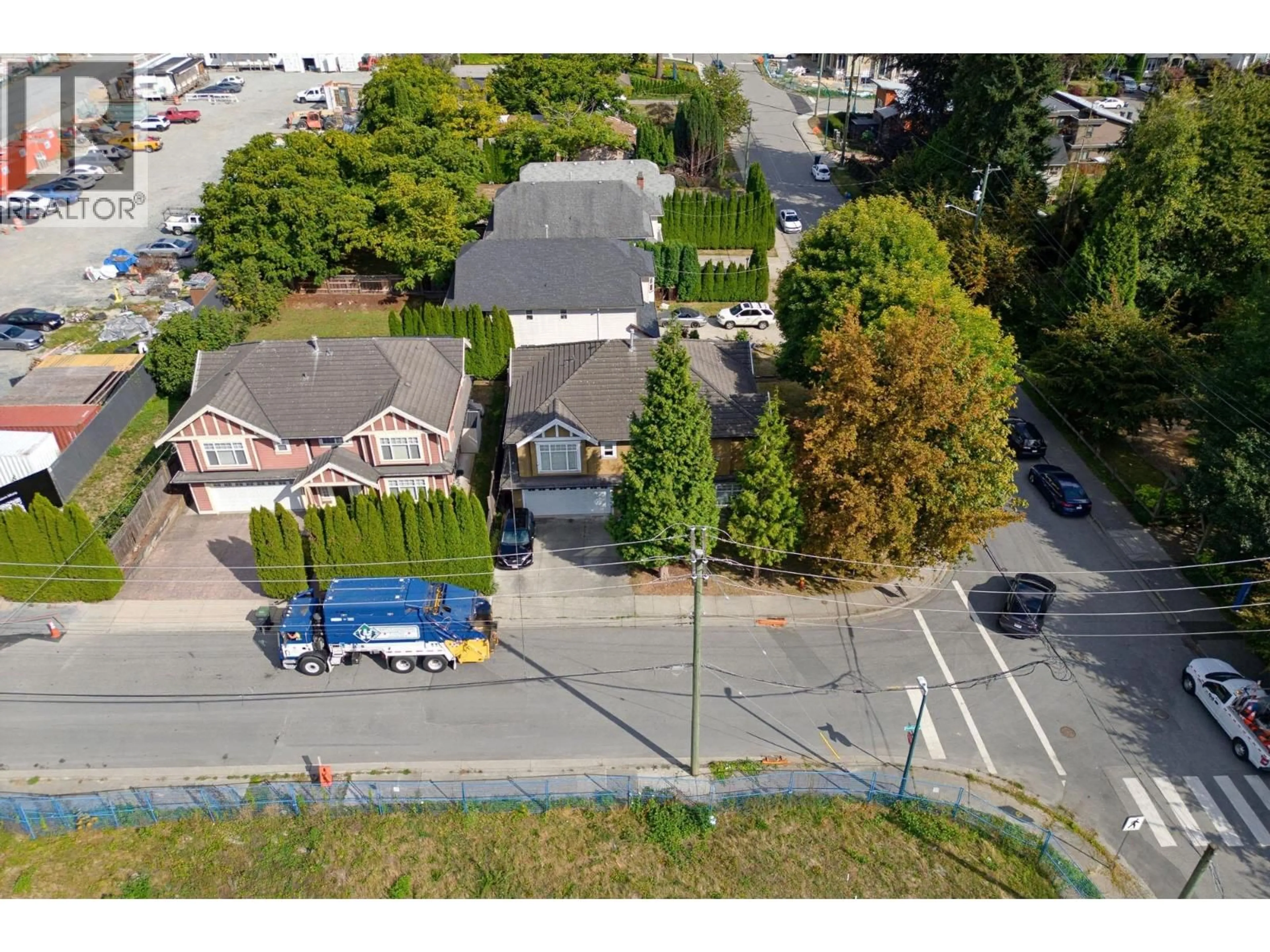 A pic from outside/outdoor area/front of a property/back of a property/a pic from drone, street for 575 ALDERSON AVENUE, Coquitlam British Columbia V3K1T4