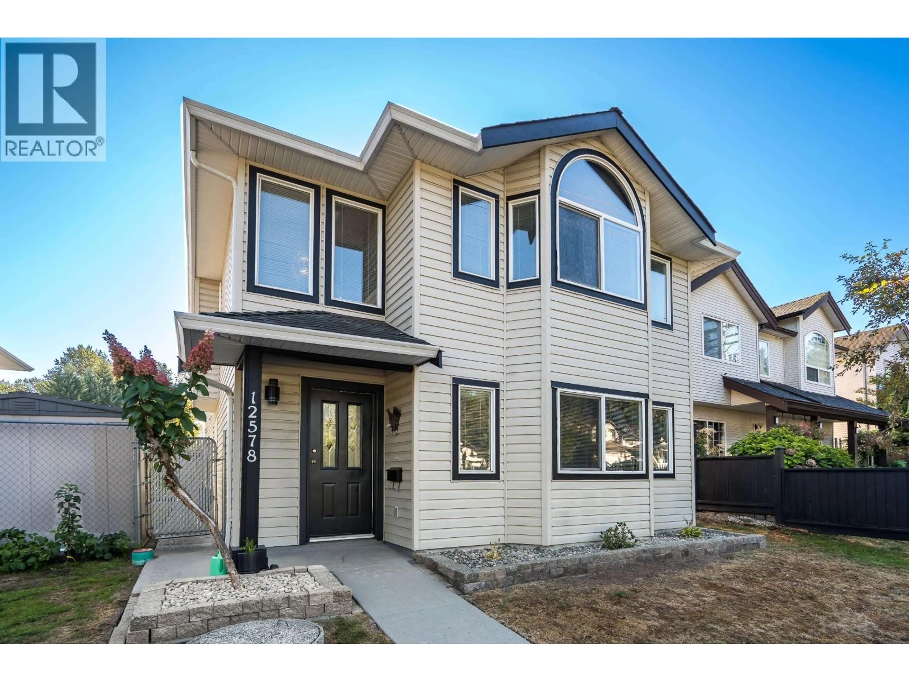 Home with vinyl exterior material, street for 12578 224 STREET, Maple Ridge British Columbia V2X6C1