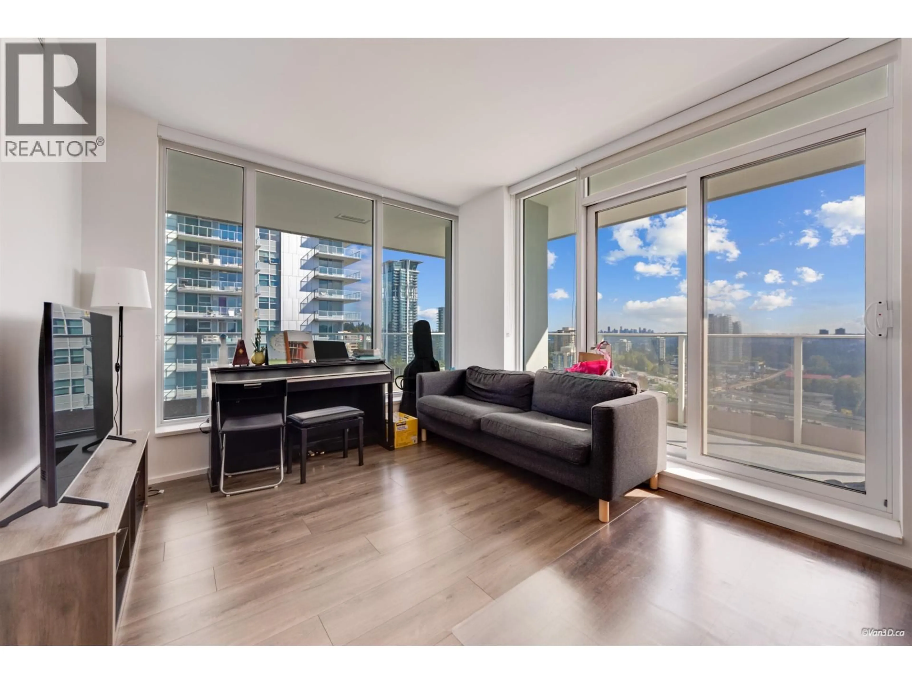 Living room with furniture, wood/laminate floor for 905 - 3833 EVERGREEN PLACE, Burnaby British Columbia V3J0M2