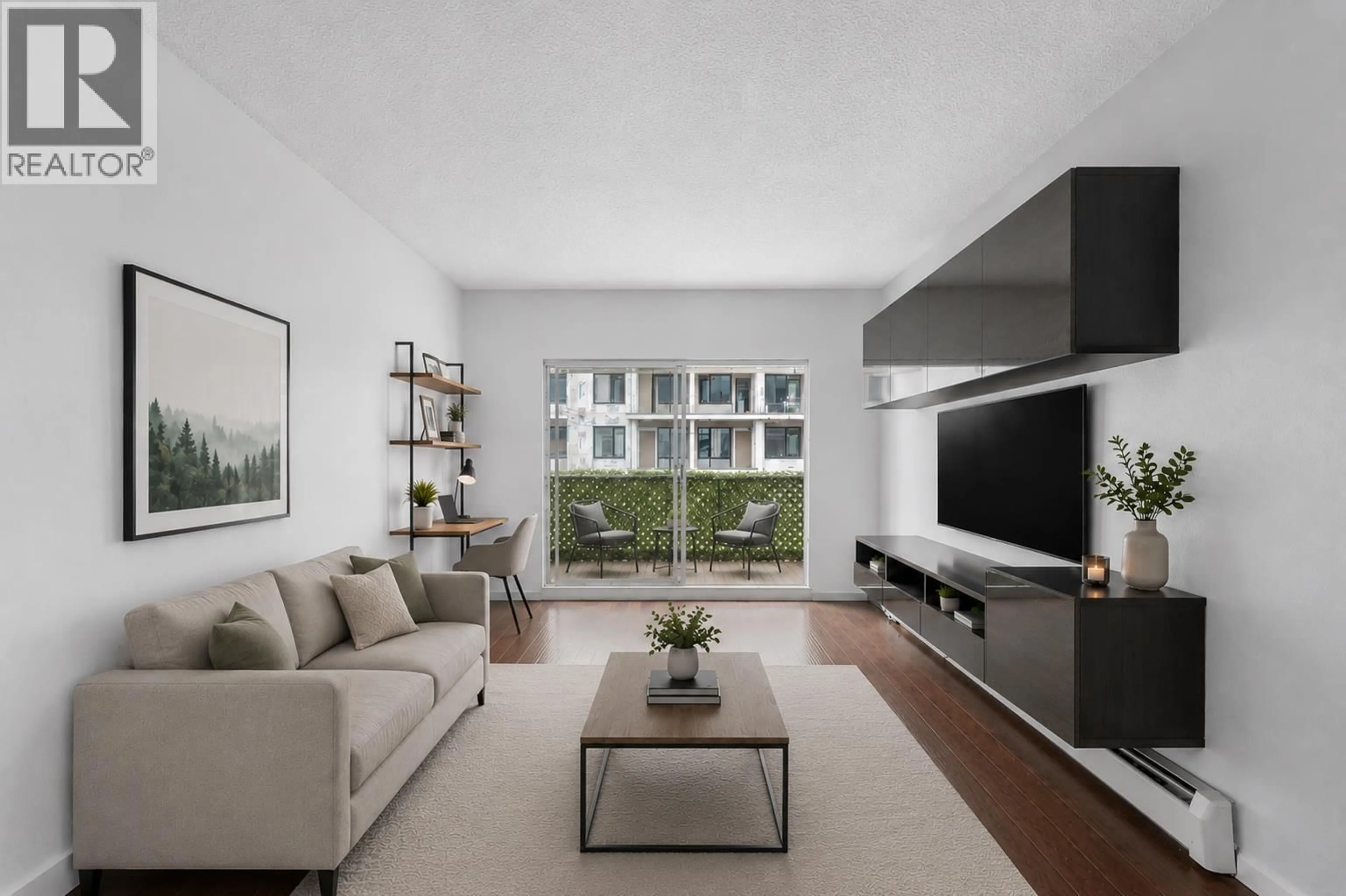 Living room with furniture, unknown for 304 - 827 16TH STREET, North Vancouver British Columbia V7P1R2