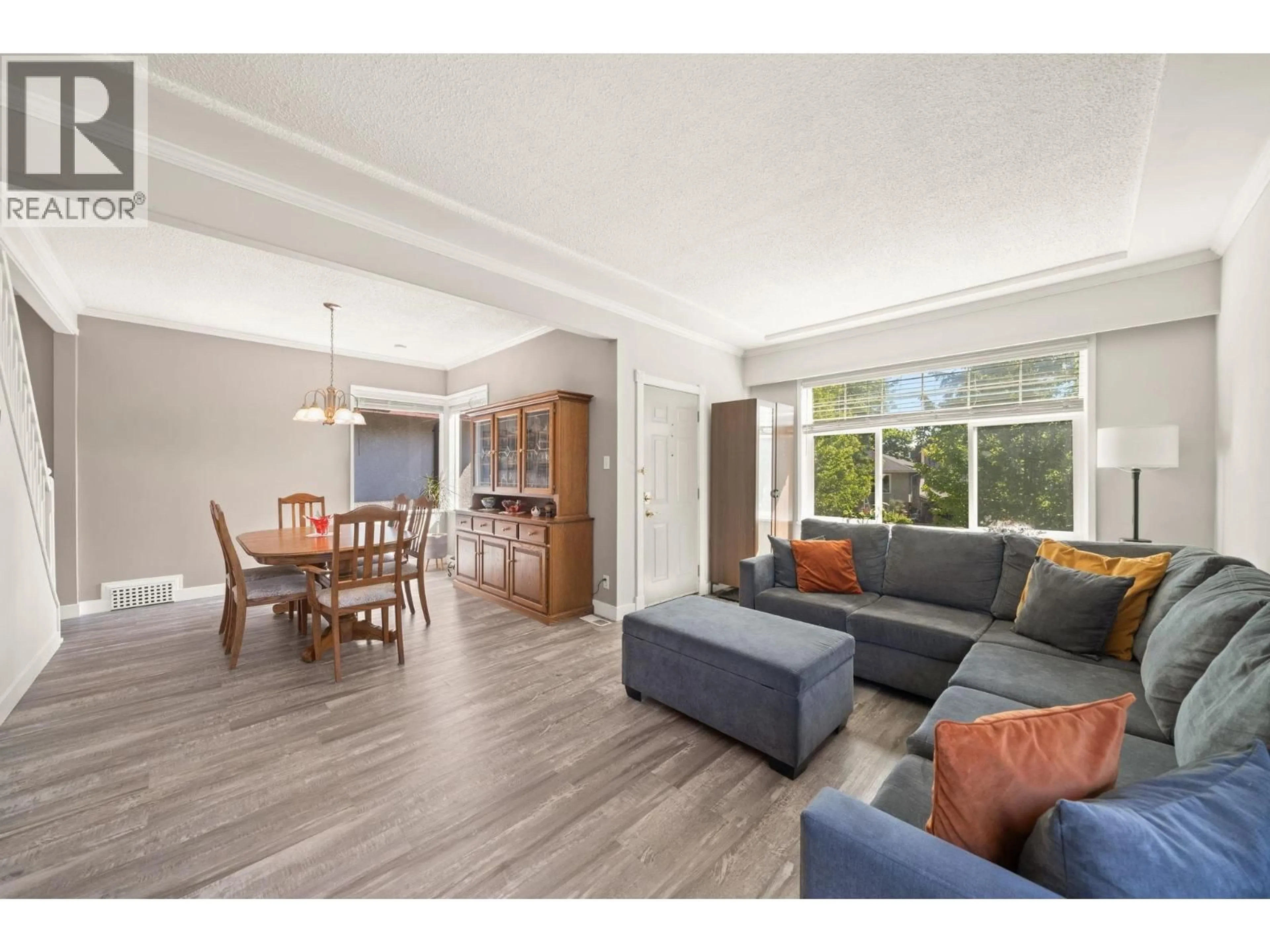 Living room with furniture, wood/laminate floor for 5743 ST. MARGARETS STREET, Vancouver British Columbia V5R3H6