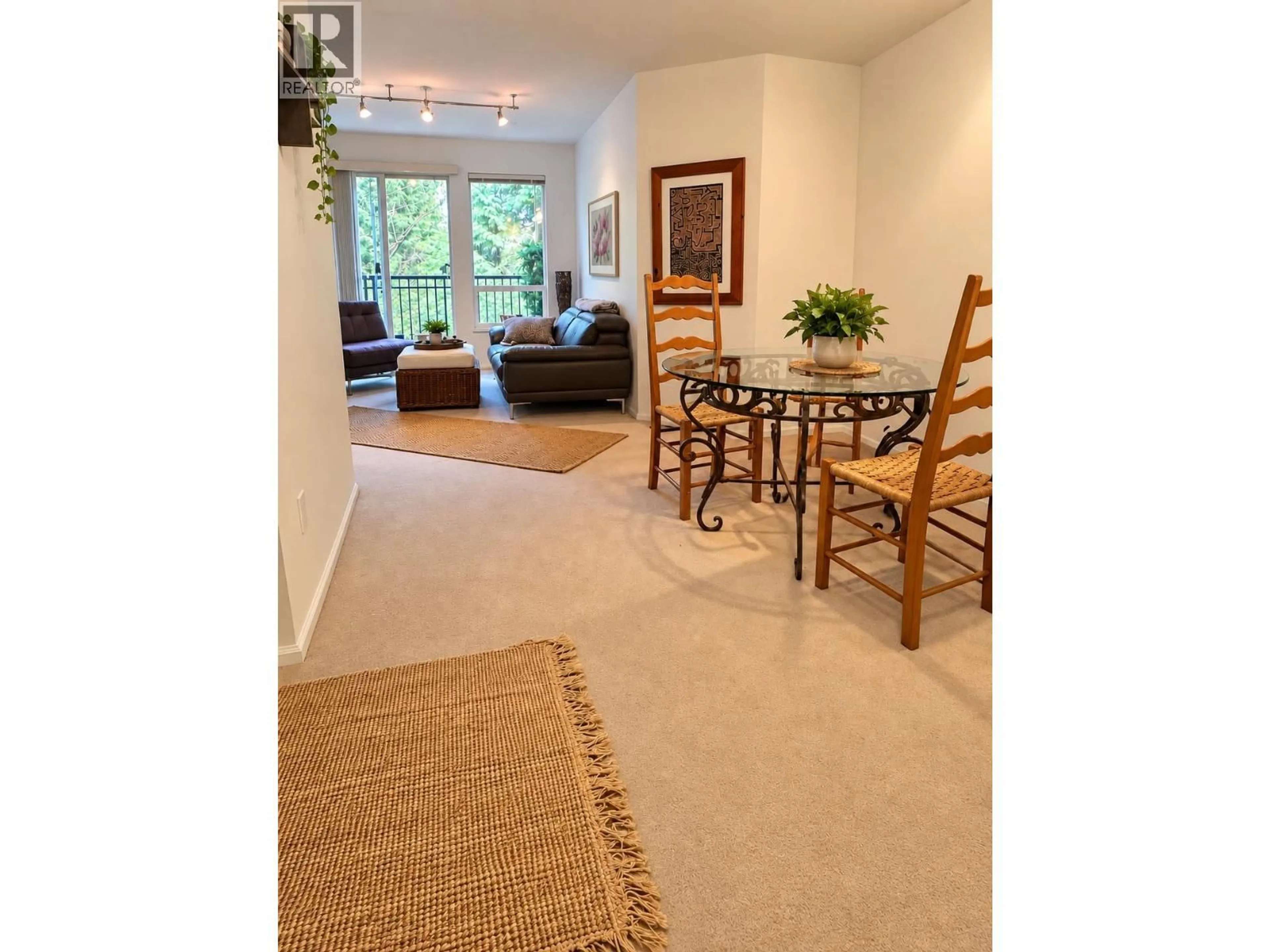 Living room with furniture, carpet floor for 310 - 1150 29TH STREET, North Vancouver British Columbia V7K3E2