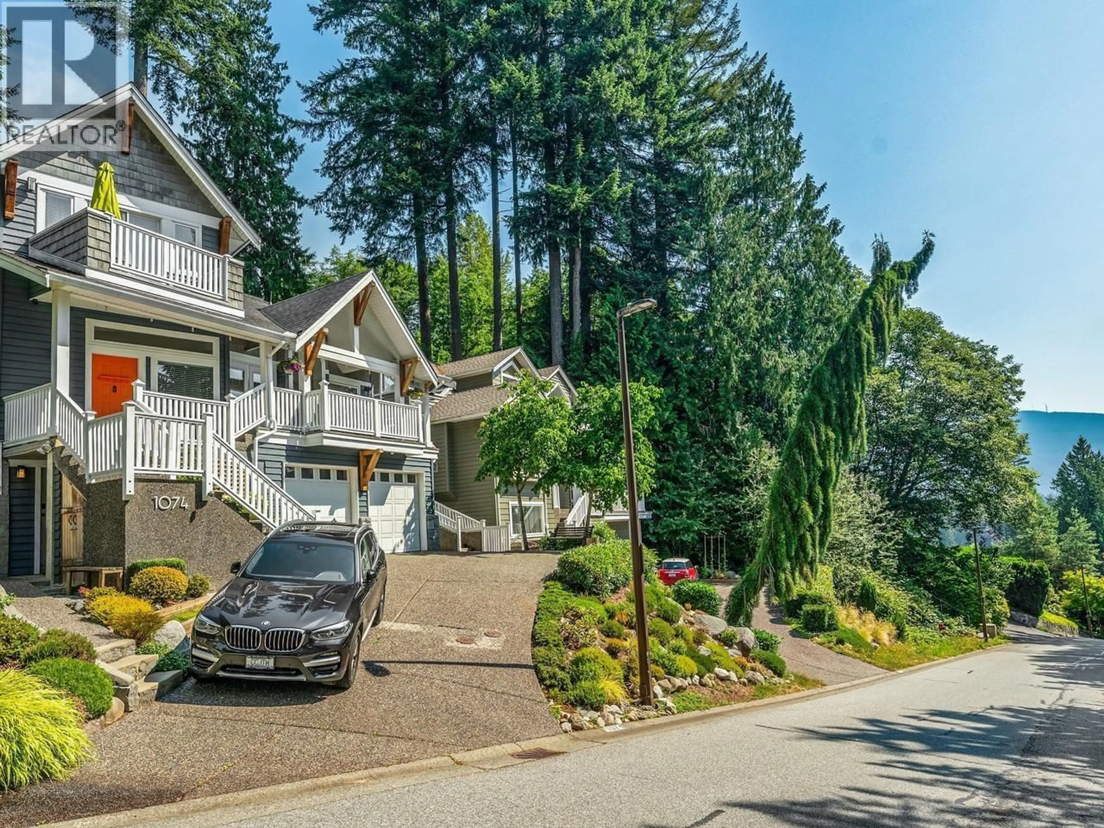 A pic from outside/outdoor area/front of a property/back of a property/a pic from drone, street for 1074 KILMER ROAD, North Vancouver British Columbia V7K1R1