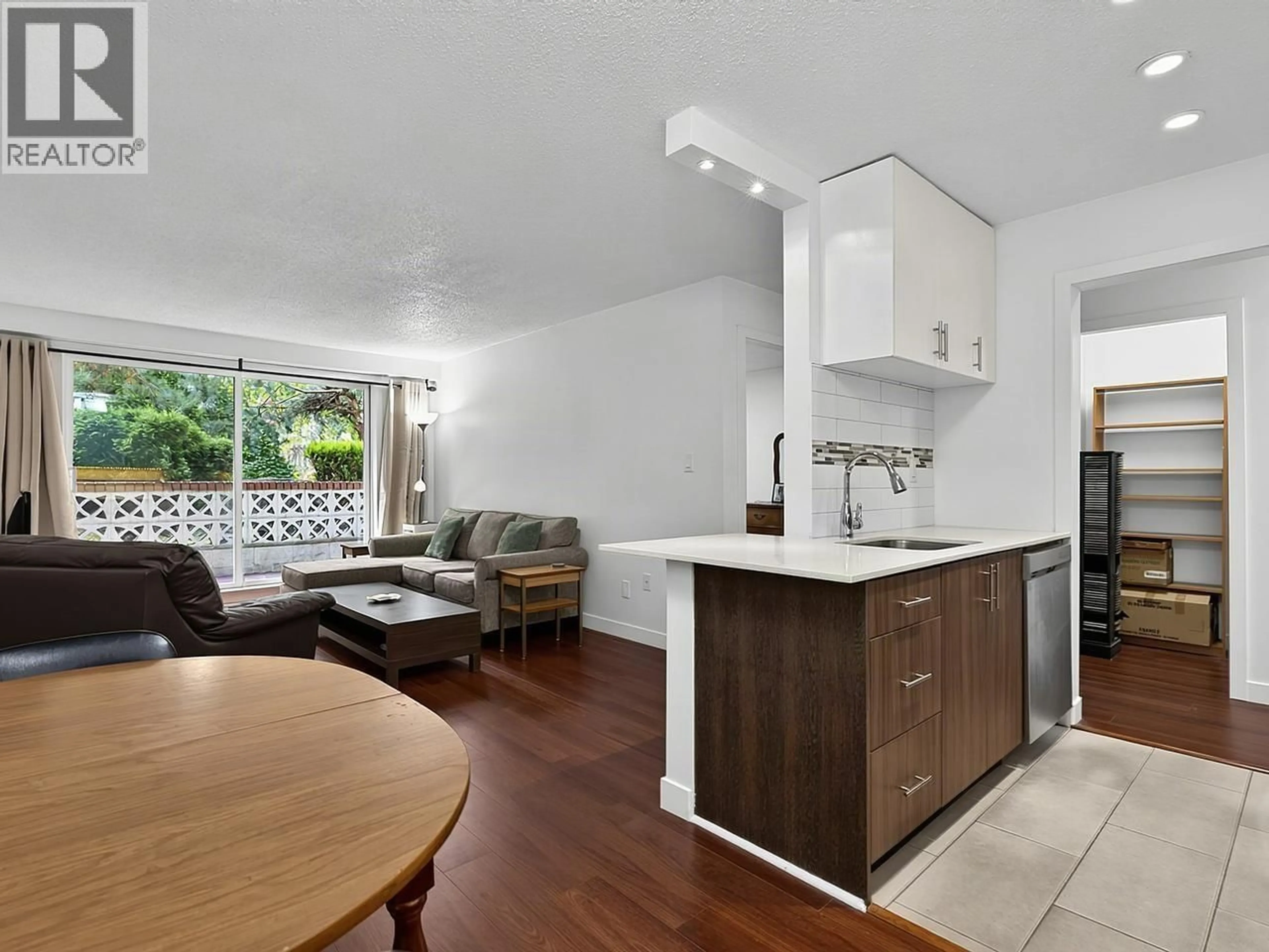 Open concept kitchen, unknown for 101 - 750 7TH AVENUE, Vancouver British Columbia V5T4H5