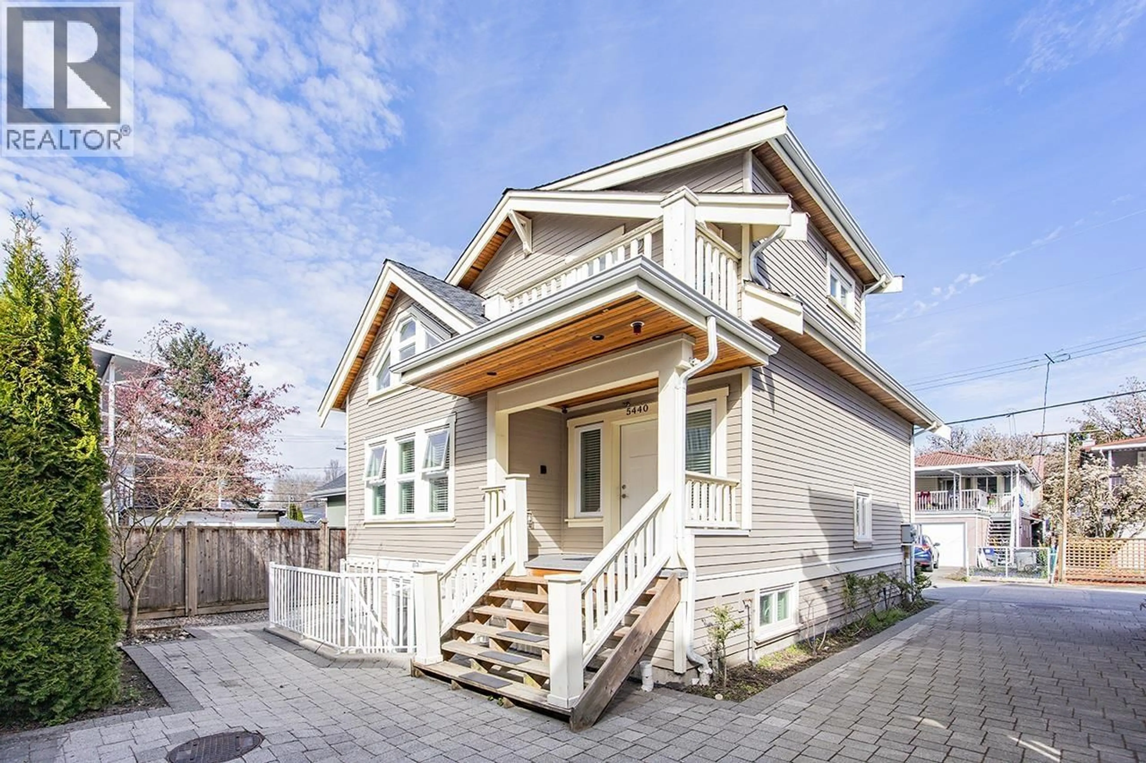 Home with vinyl exterior material, street for 5440 RHODES STREET, Vancouver British Columbia V5R3N9