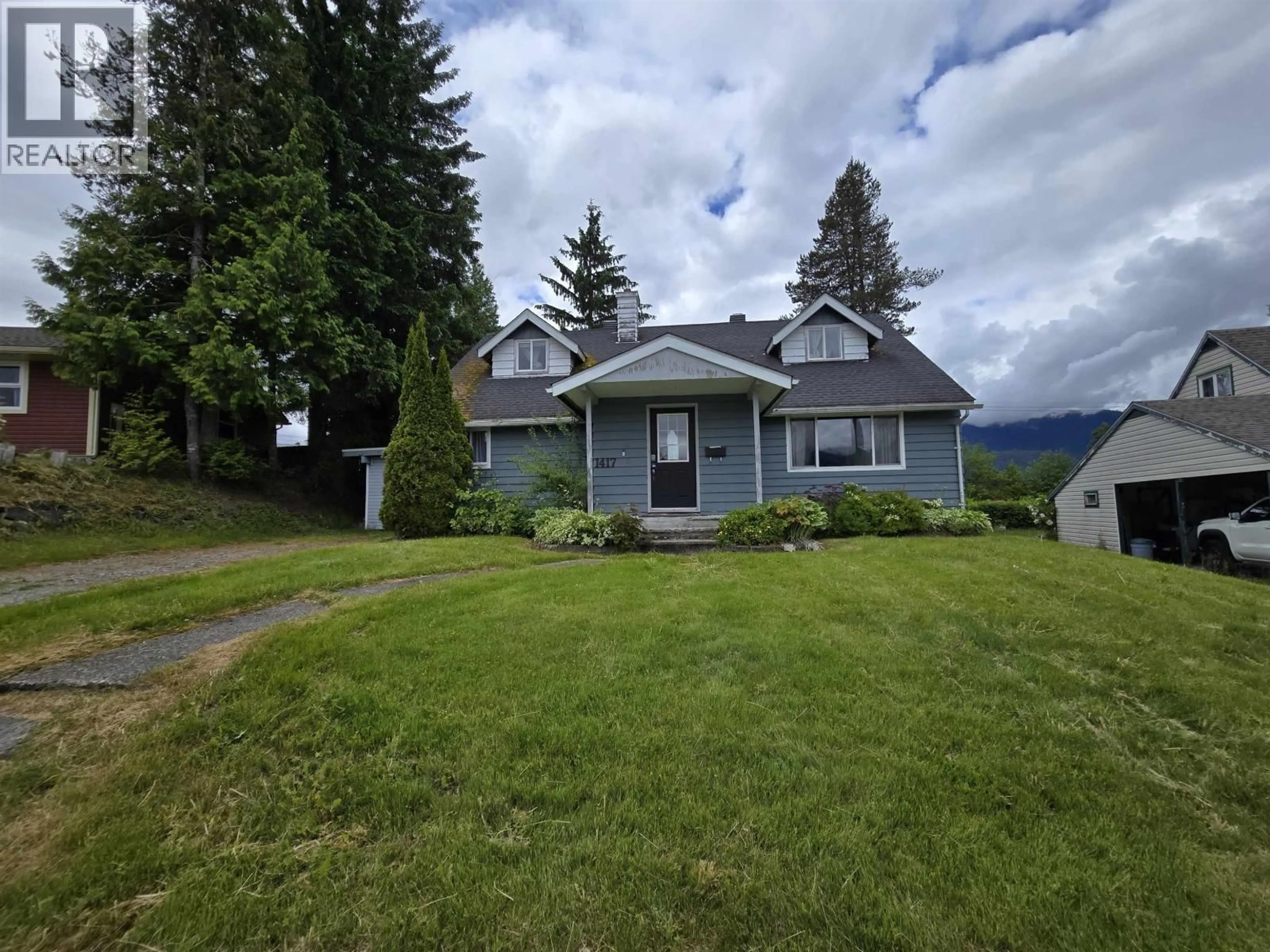 A pic from outside/outdoor area/front of a property/back of a property/a pic from drone, mountain view for 1417 CORMORANT AVENUE, Kitimat British Columbia V8C1R7