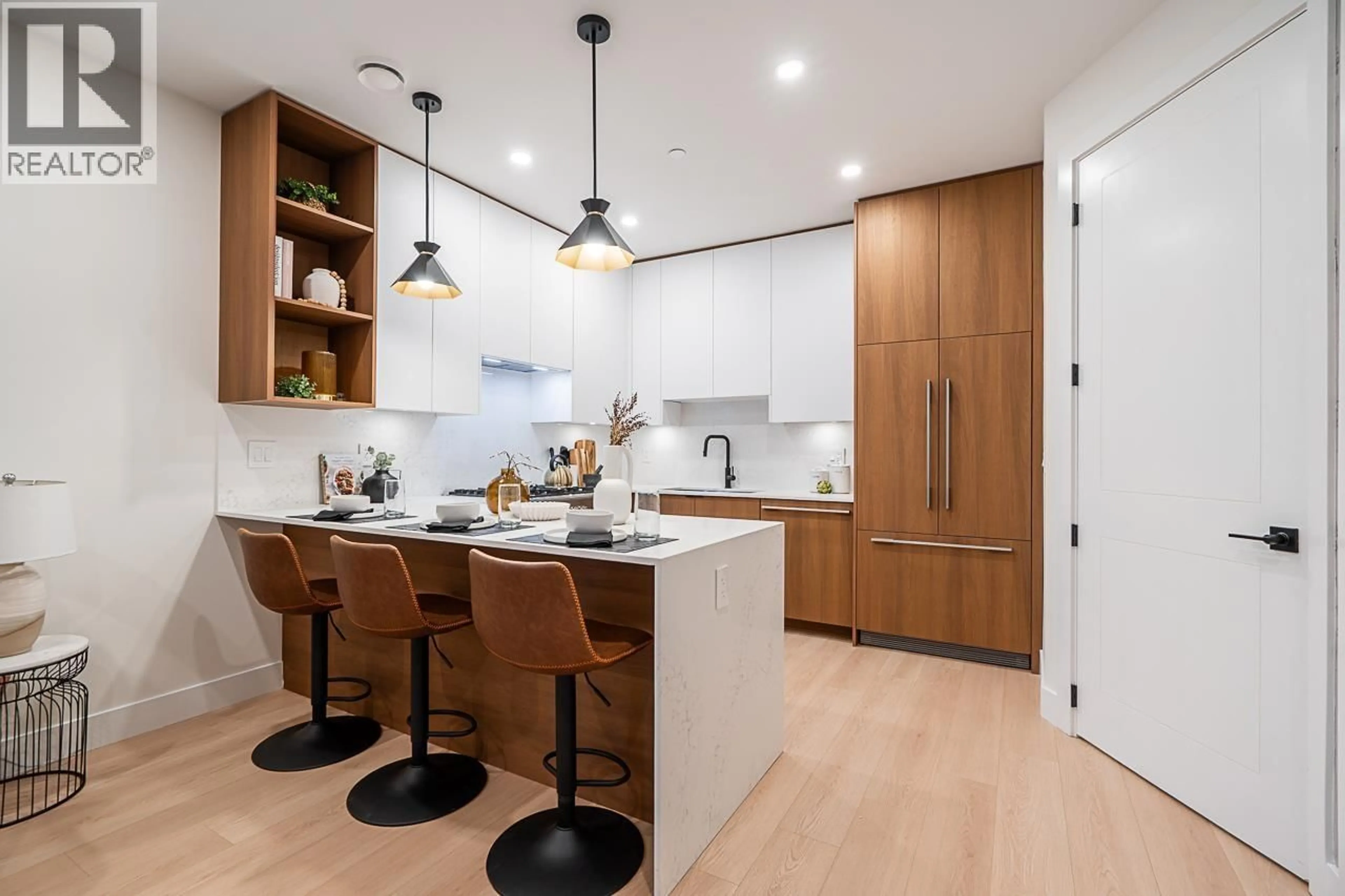 Contemporary kitchen, wood/laminate floor for 3 - 3638 NORMANDY DRIVE, Vancouver British Columbia V5M2G3
