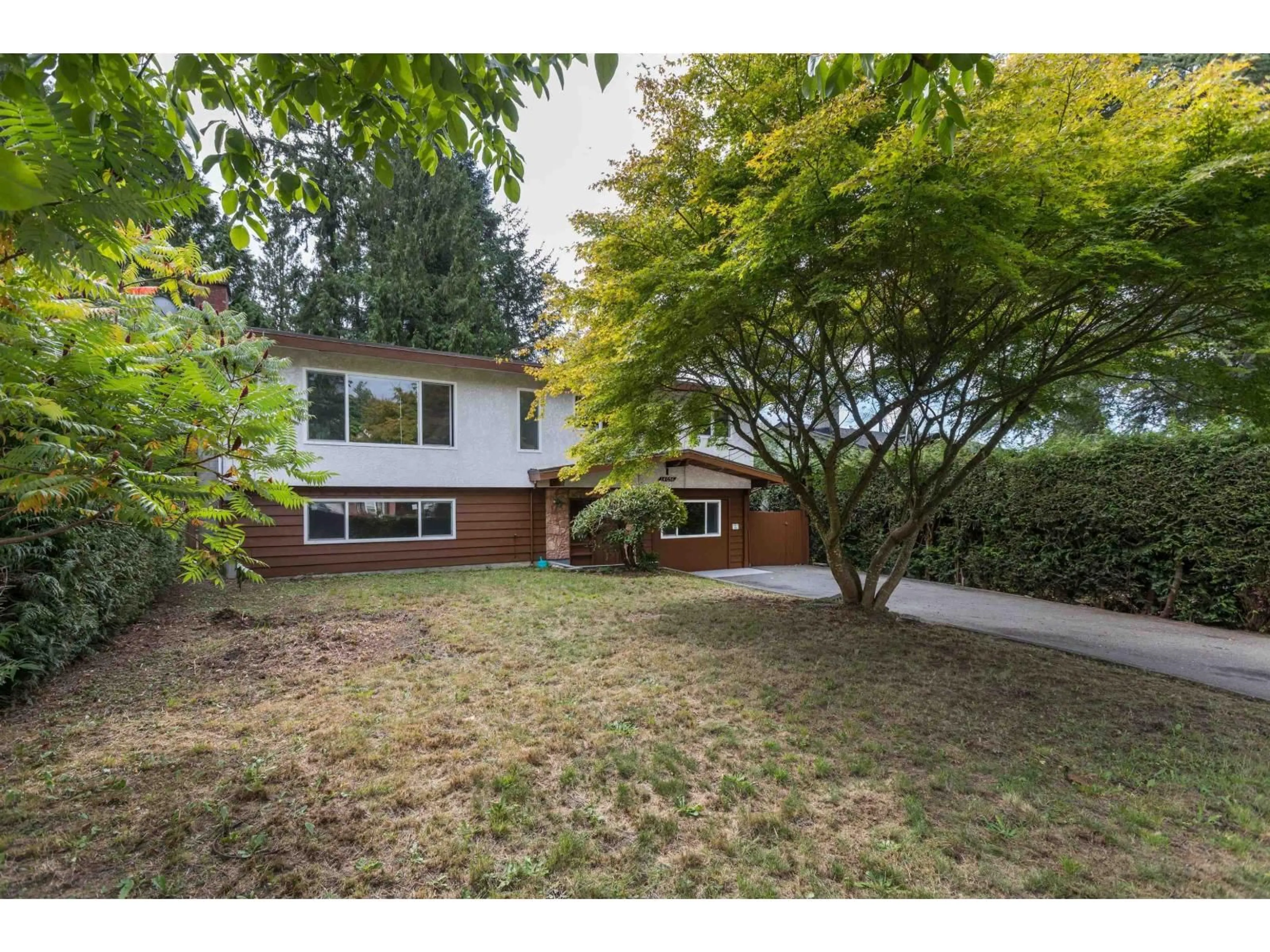 A pic from outside/outdoor area/front of a property/back of a property/a pic from drone, street for 14036 102A AVENUE, Surrey British Columbia V3T1P9