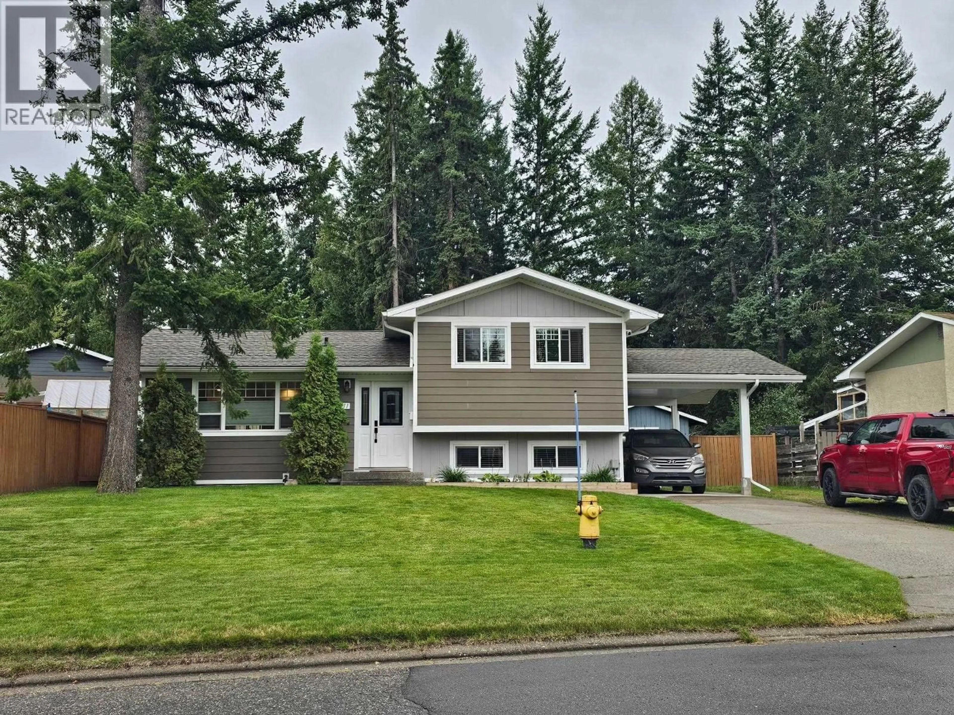 Home with vinyl exterior material, street for 7511 JEAN DE BREBEUF CRESCENT, Prince George British Columbia V2N3A8