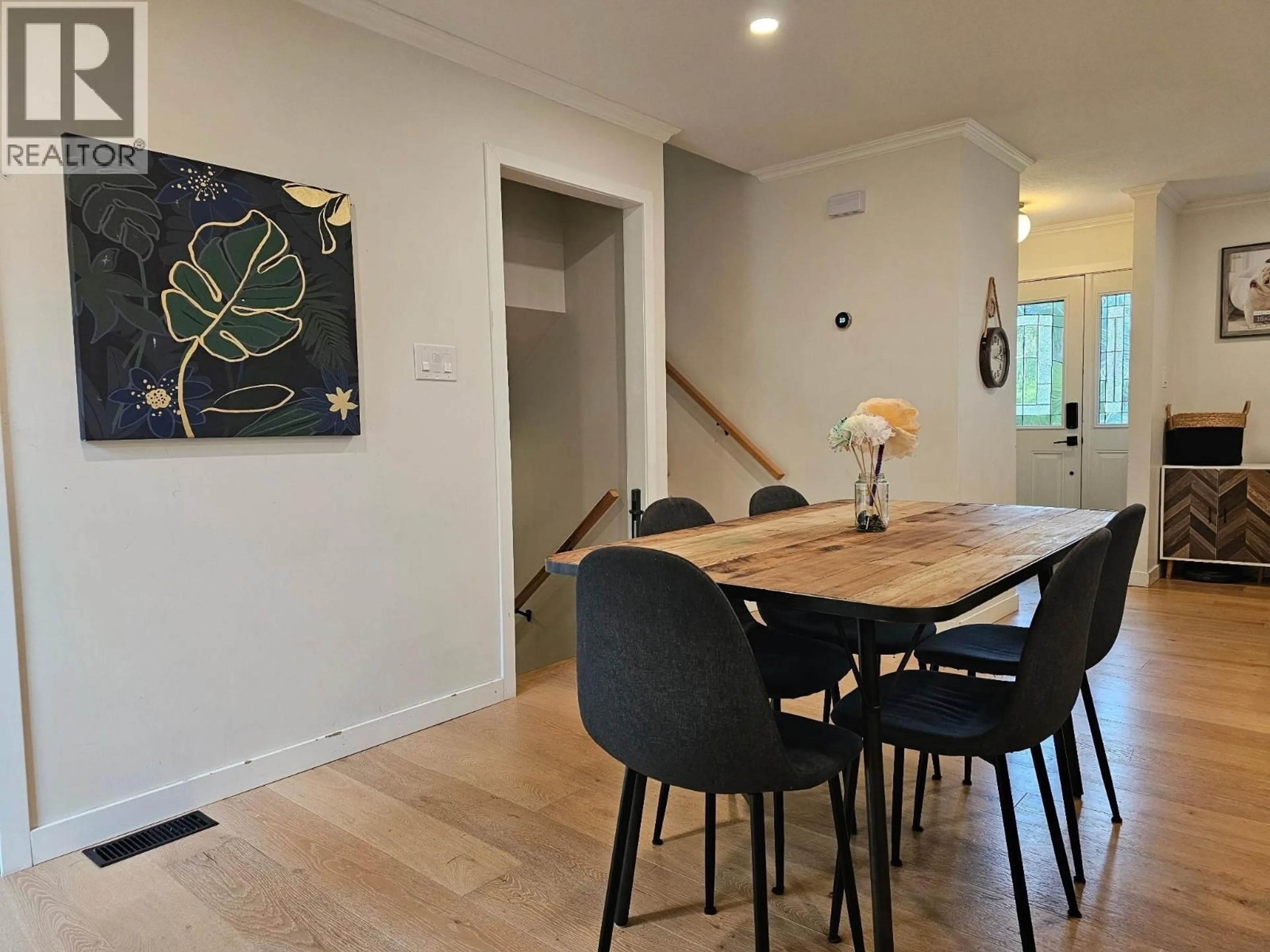 Dining room, wood/laminate floor for 7511 JEAN DE BREBEUF CRESCENT, Prince George British Columbia V2N3A8