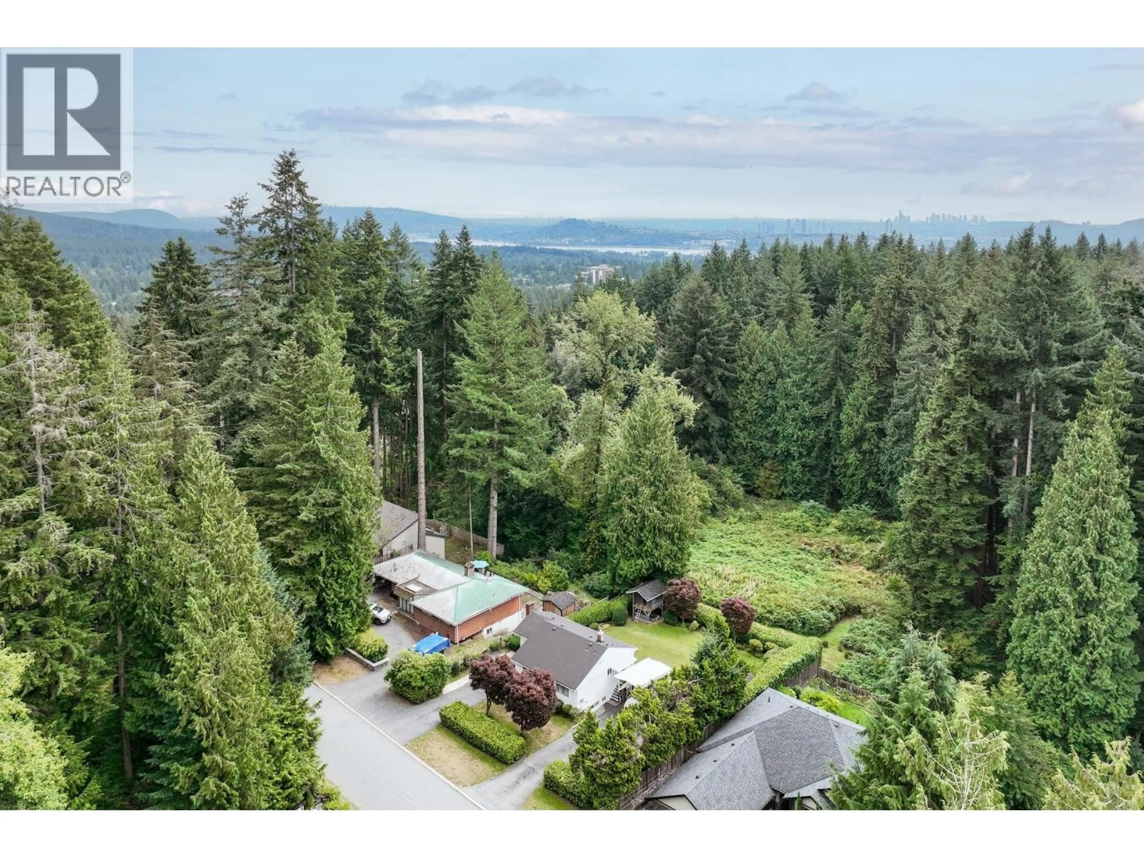 A pic from outside/outdoor area/front of a property/back of a property/a pic from drone, forest/trees view for 741 WELLINGTON DRIVE, North Vancouver British Columbia V7K1K8