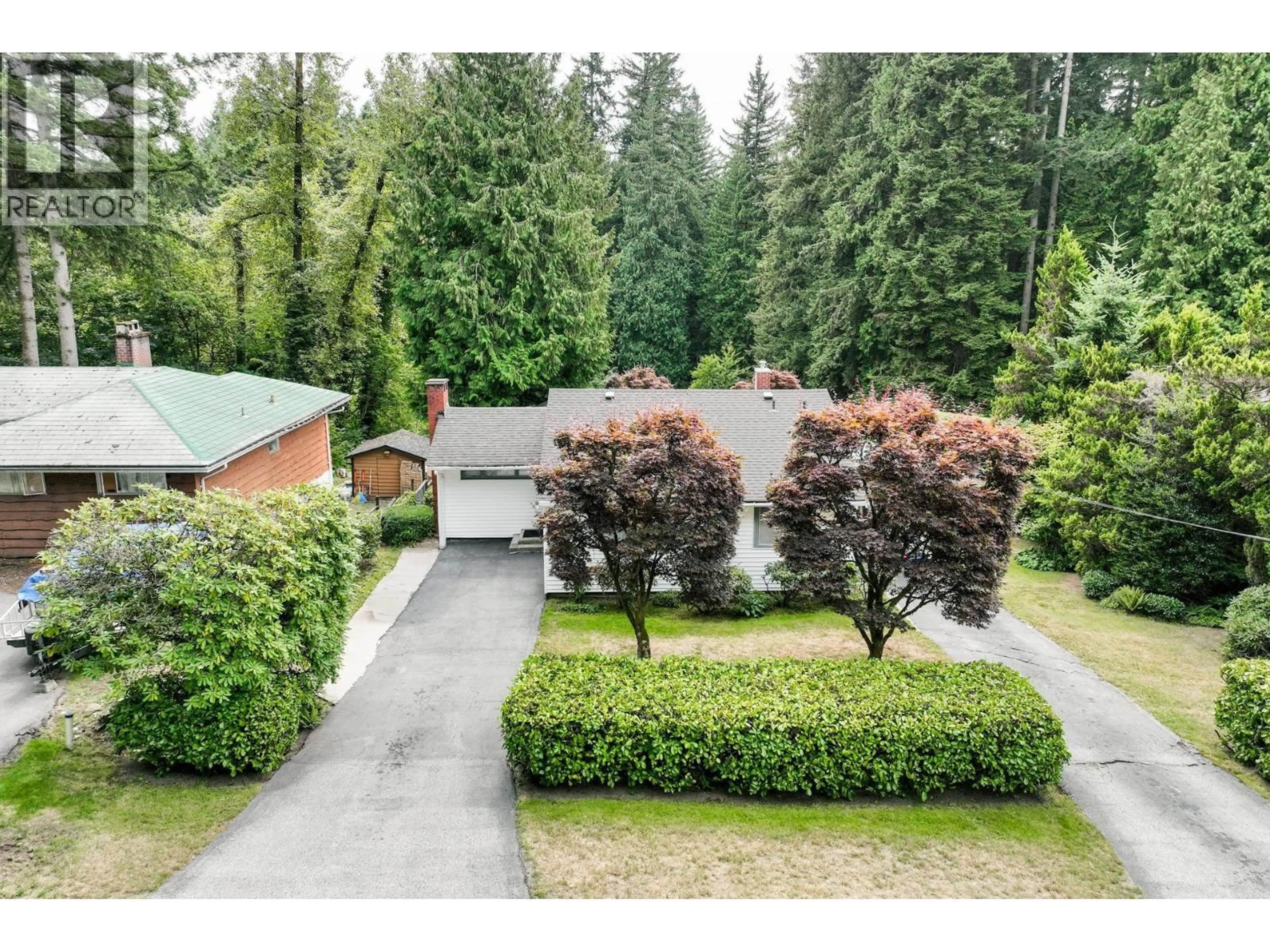 A pic from outside/outdoor area/front of a property/back of a property/a pic from drone, forest/trees view for 741 WELLINGTON DRIVE, North Vancouver British Columbia V7K1K8