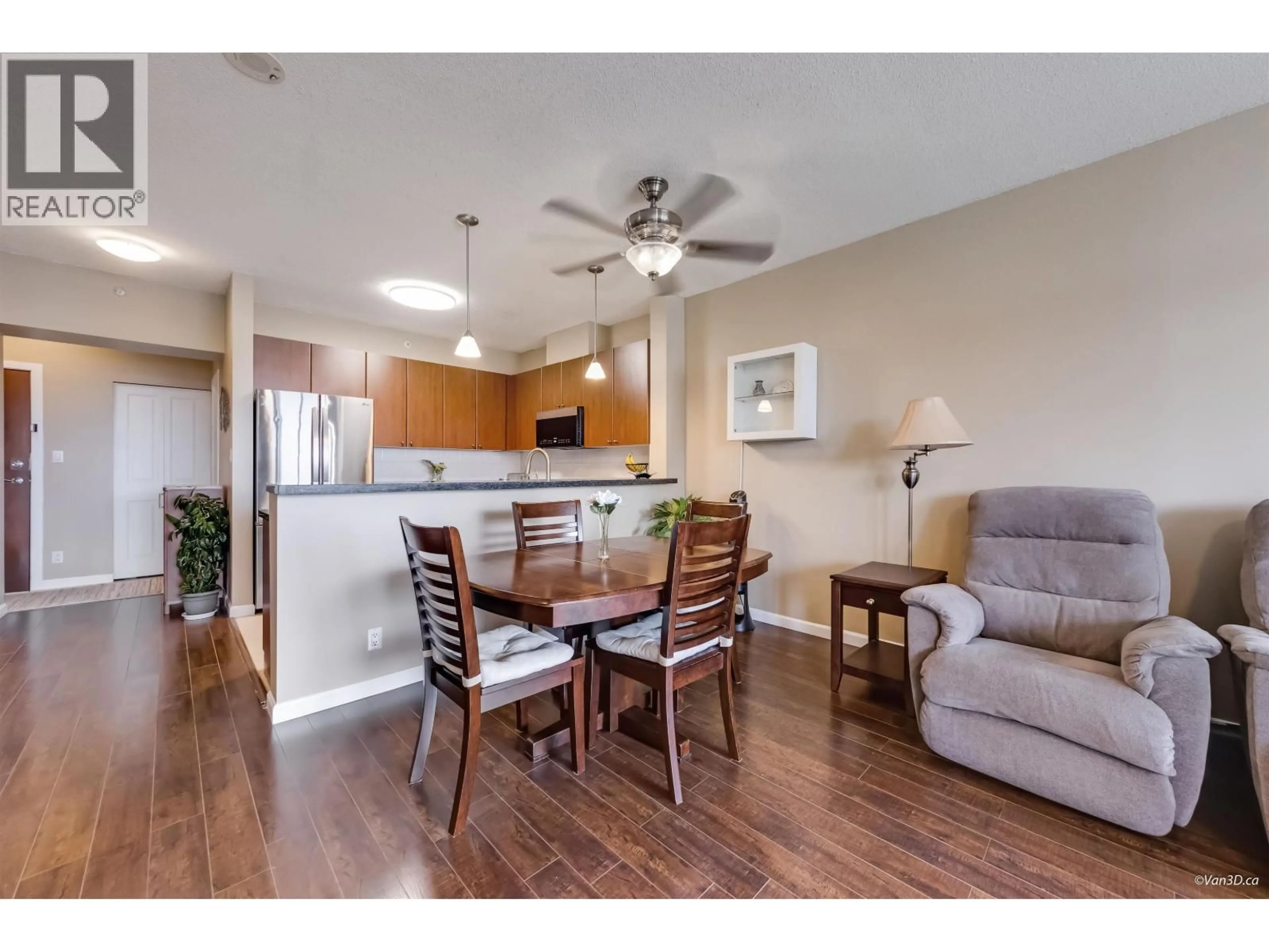 Open concept kitchen, wood/laminate floor for 501 - 4132 HALIFAX STREET, Burnaby British Columbia V5C6V1
