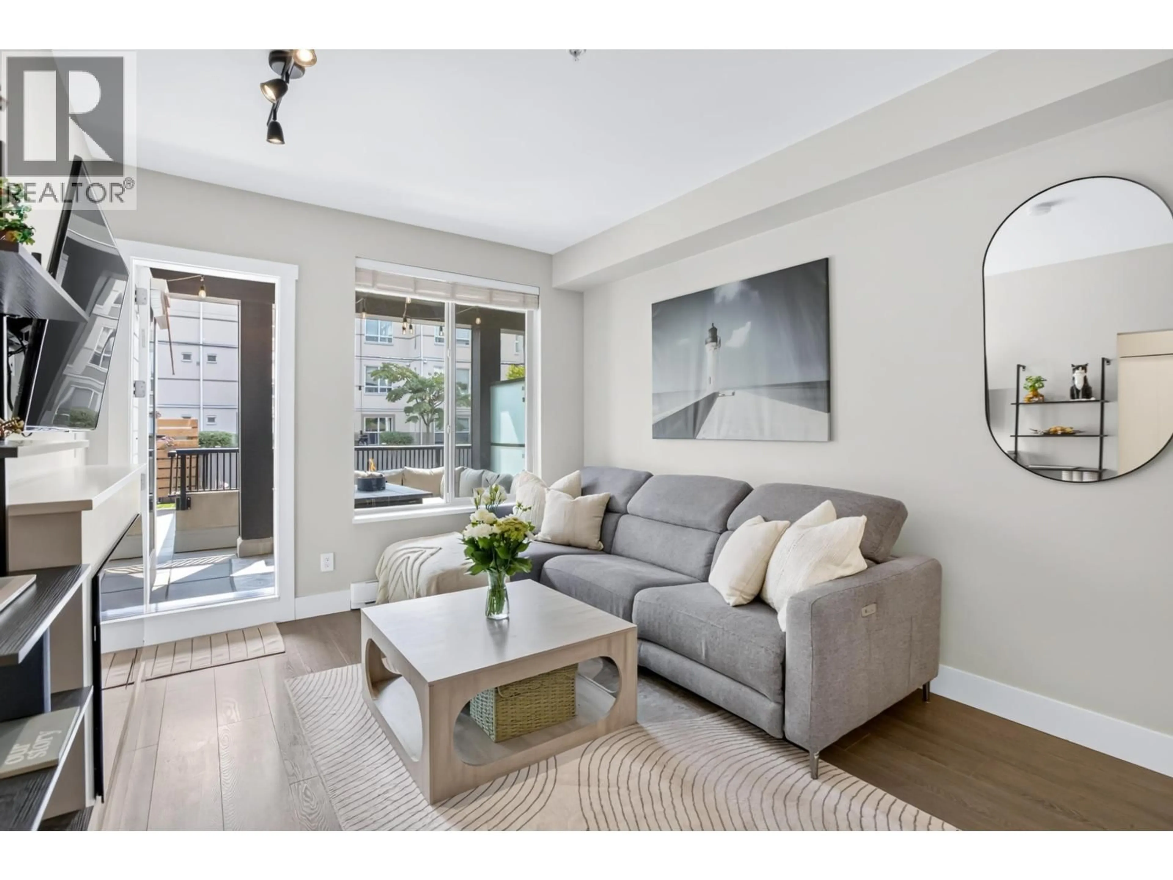 Living room with furniture, unknown for 106 - 2460 KELLY AVENUE, Port Coquitlam British Columbia V3C0E3