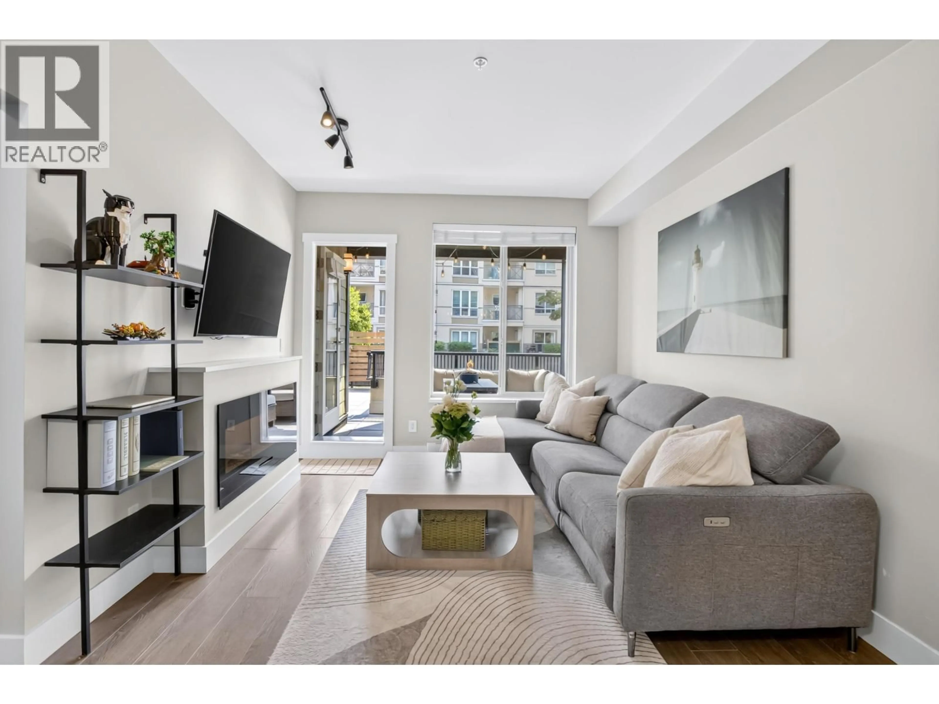 Living room with furniture, unknown for 106 - 2460 KELLY AVENUE, Port Coquitlam British Columbia V3C0E3