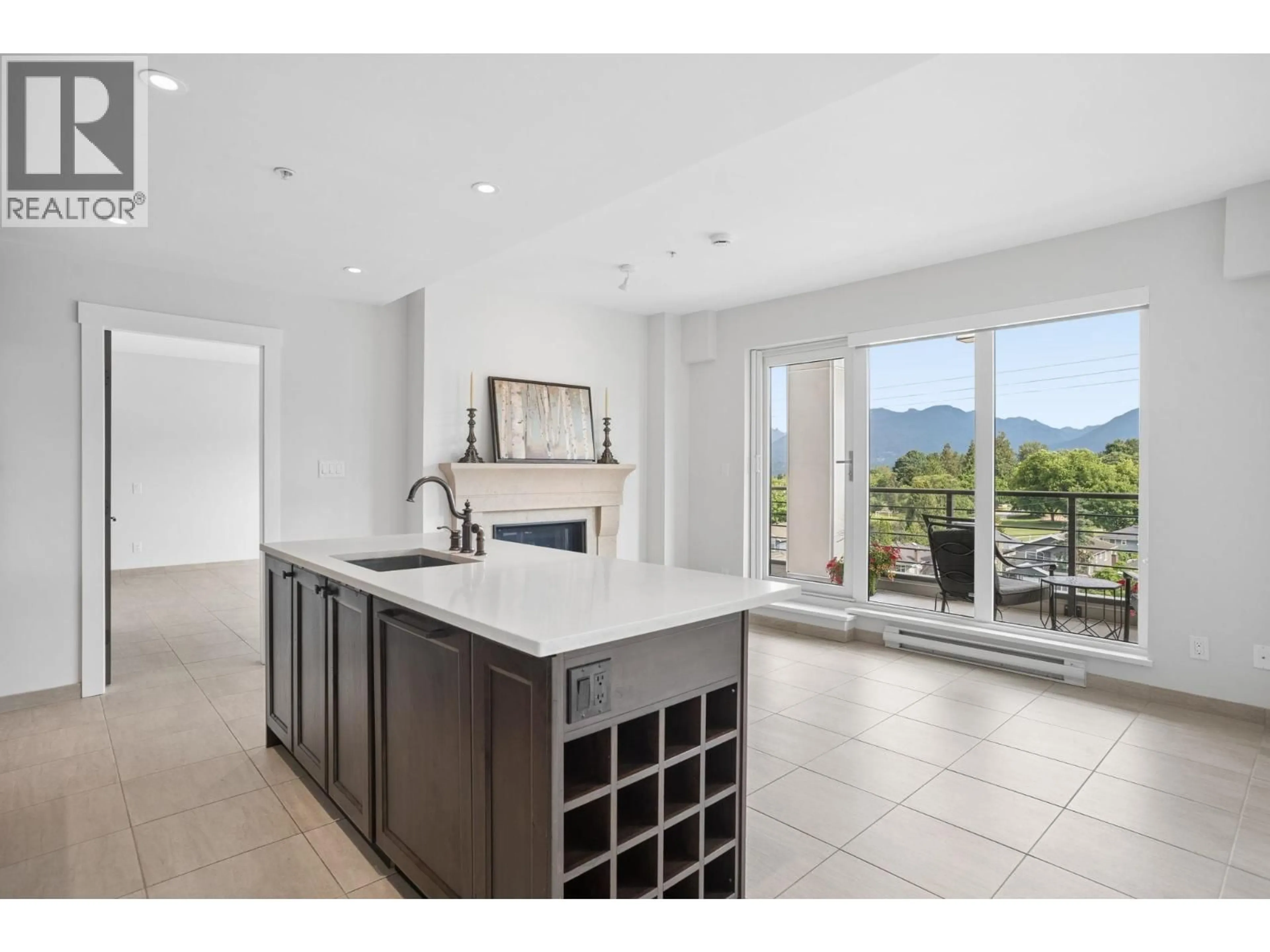 Open concept kitchen, ceramic/tile floor for 301 - 4721 HASTINGS STREET, Burnaby British Columbia V5C2K8