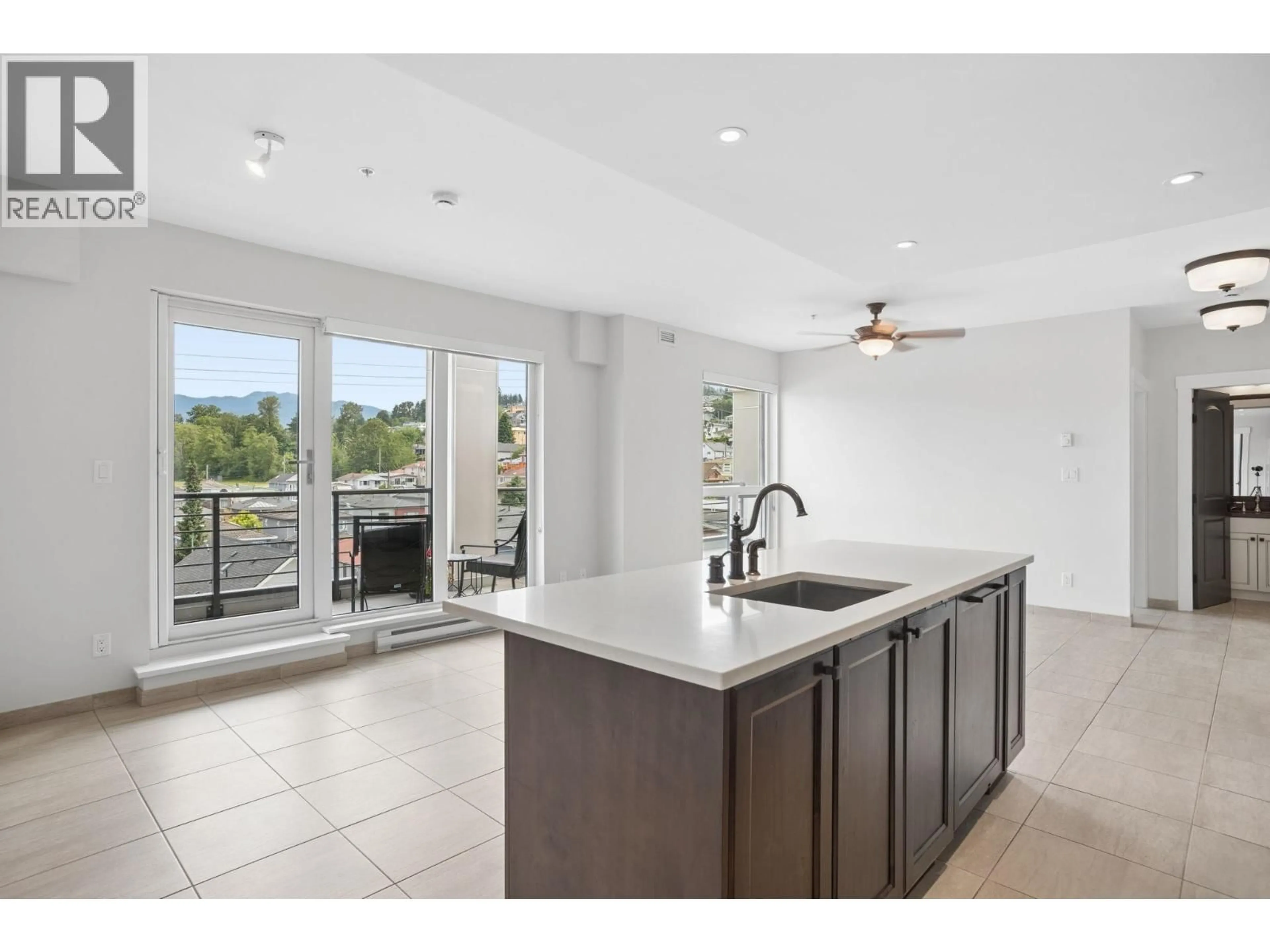 Open concept kitchen, ceramic/tile floor for 301 - 4721 HASTINGS STREET, Burnaby British Columbia V5C2K8