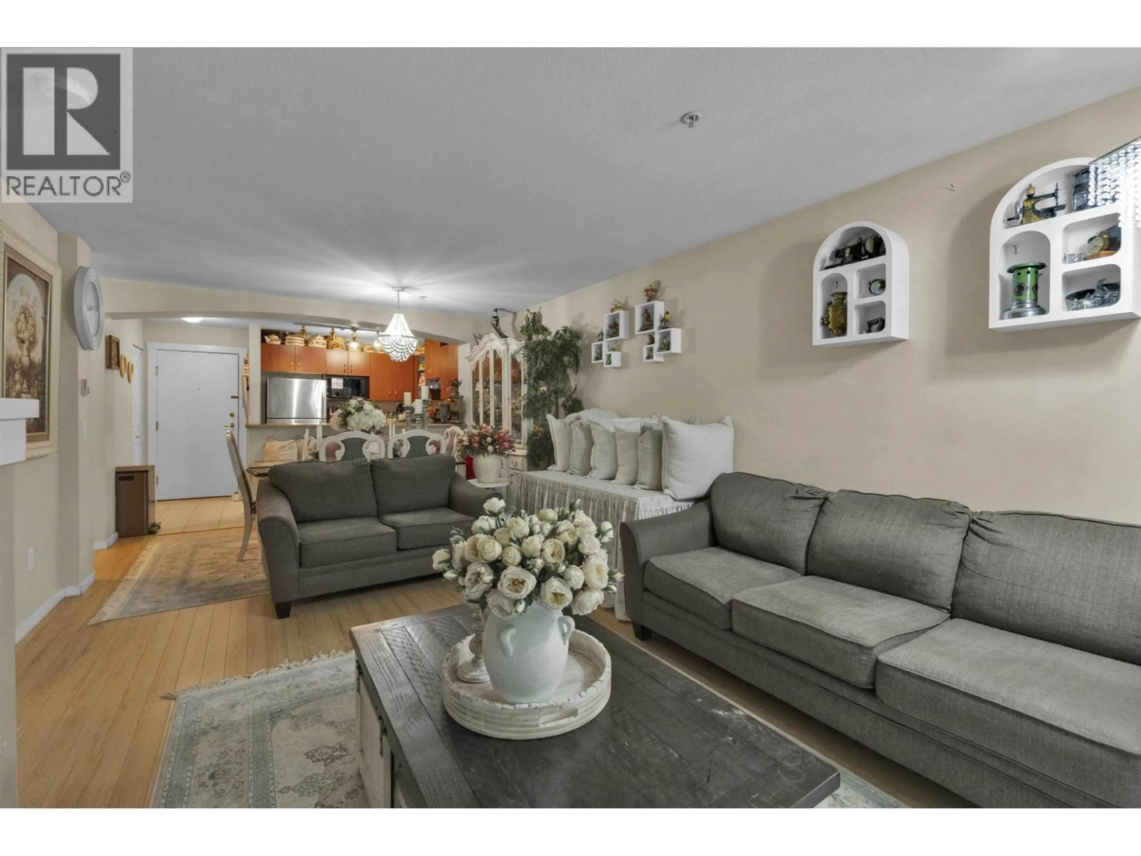 Living room with furniture, unknown for 306 - 9283 GOVERNMENT ROAD, Burnaby British Columbia V3N0A5