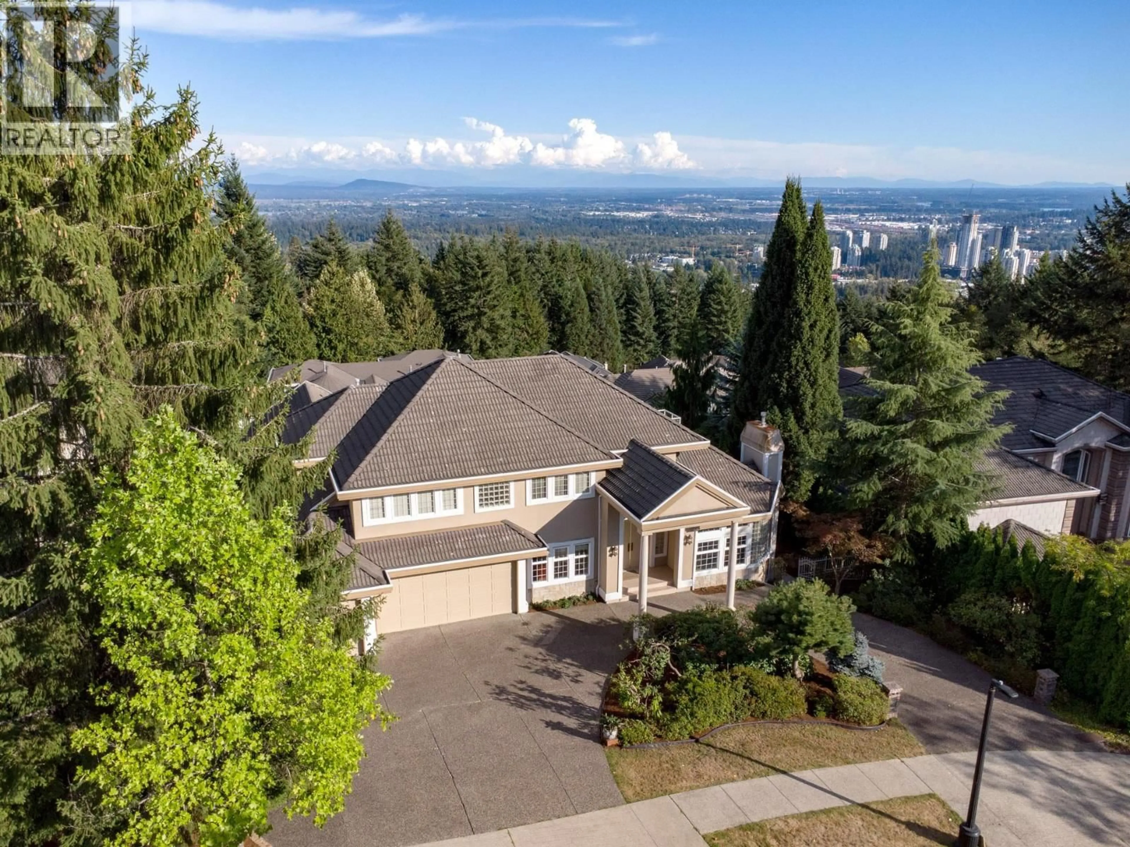 A pic from outside/outdoor area/front of a property/back of a property/a pic from drone, mountain view for 1535 PARKWAY BOULEVARD, Coquitlam British Columbia V3E2Y5