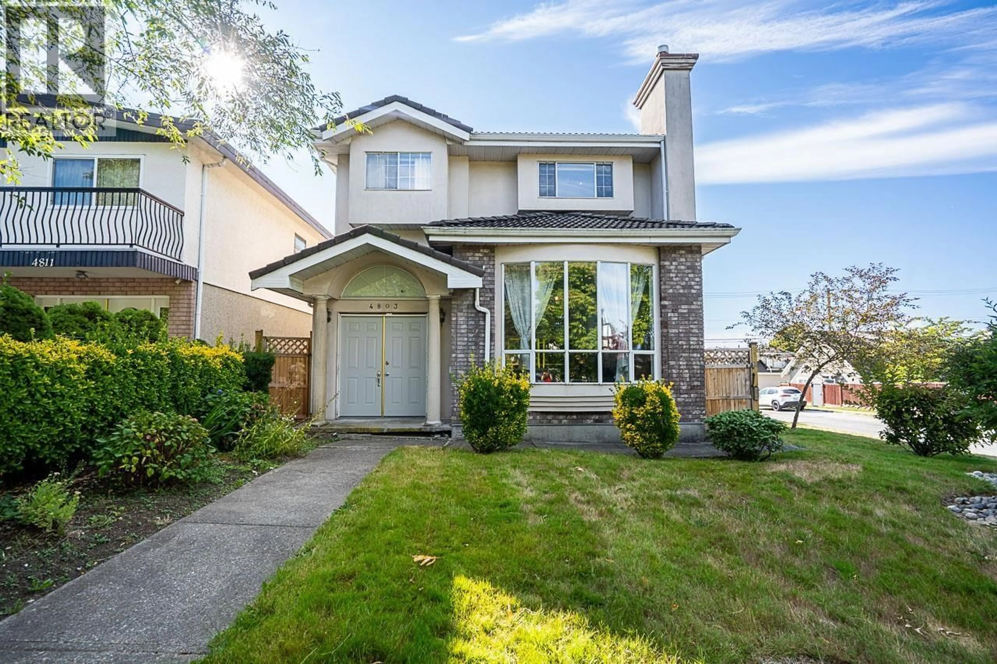 Home with vinyl exterior material, street for 4803 FLEMING STREET, Vancouver British Columbia V5N3W7